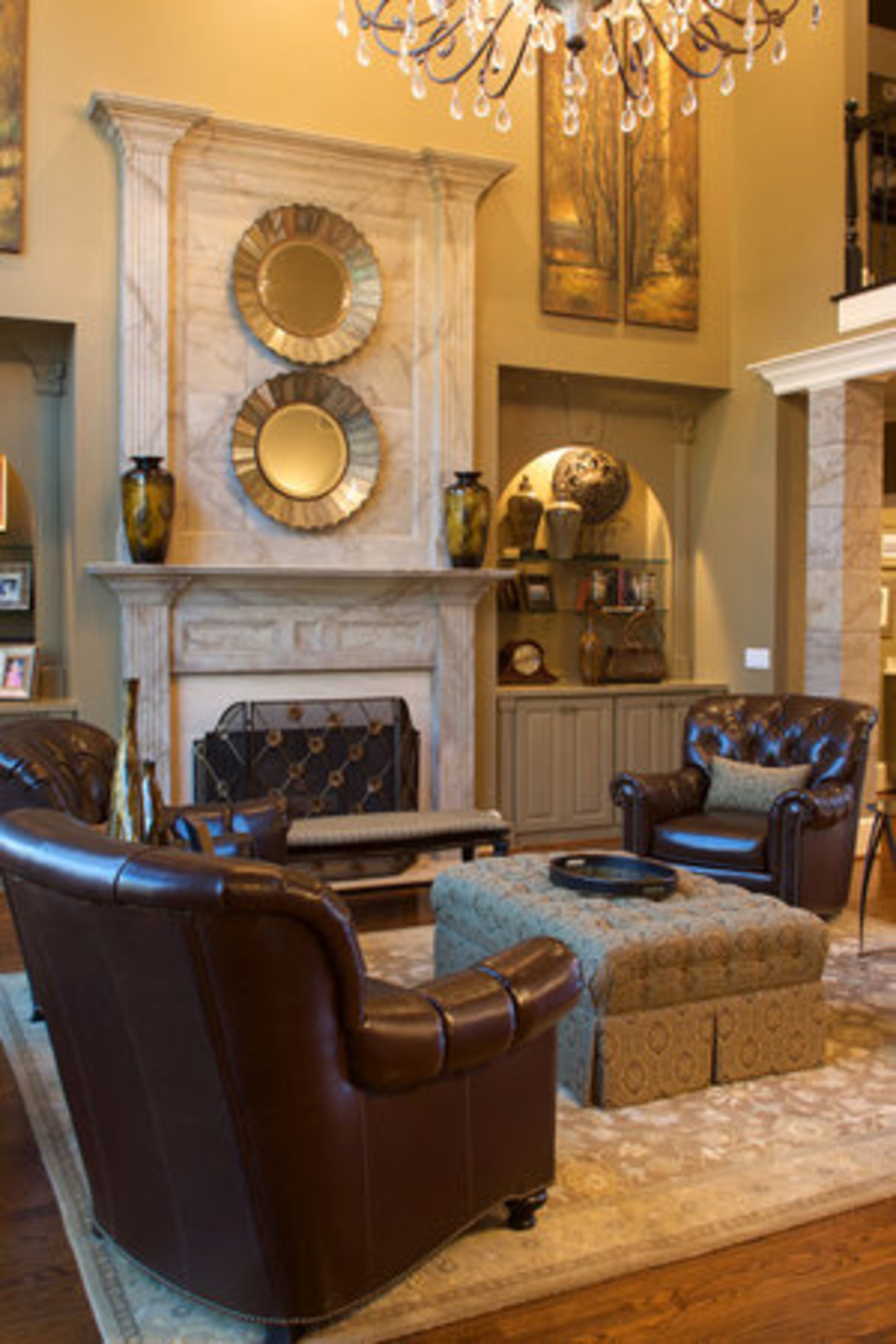 The Schmidts used an affordable technique to make the fireplace stand out. They repainted the original white finish to look like marble.