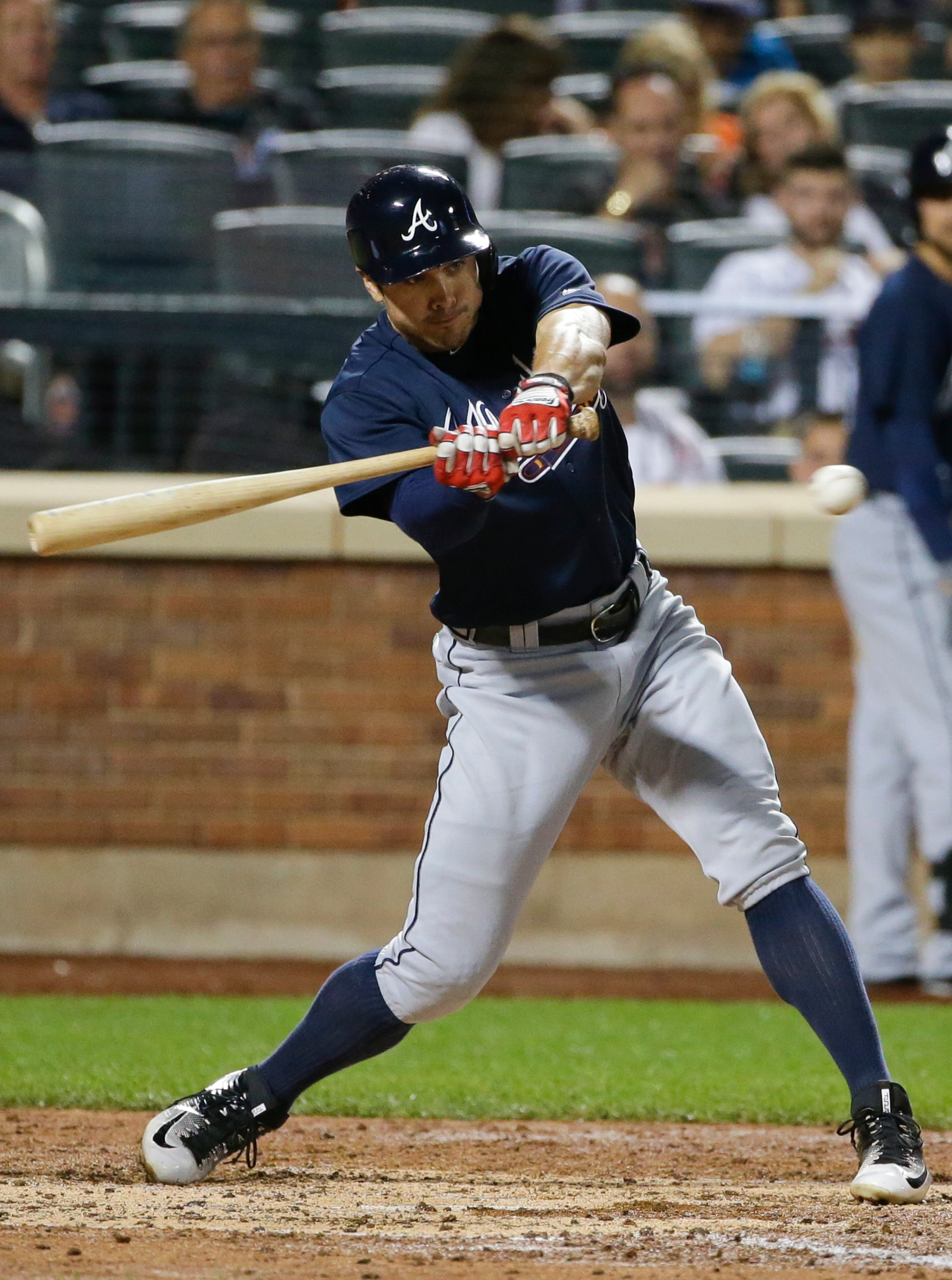 Atlanta Braves' Chase d'Arnaud swings for an RBI single during the fifth inning of a baseball game against the New York Mets on Saturday, June 18, 2016, in New York. (AP Photo/Frank Franklin II)