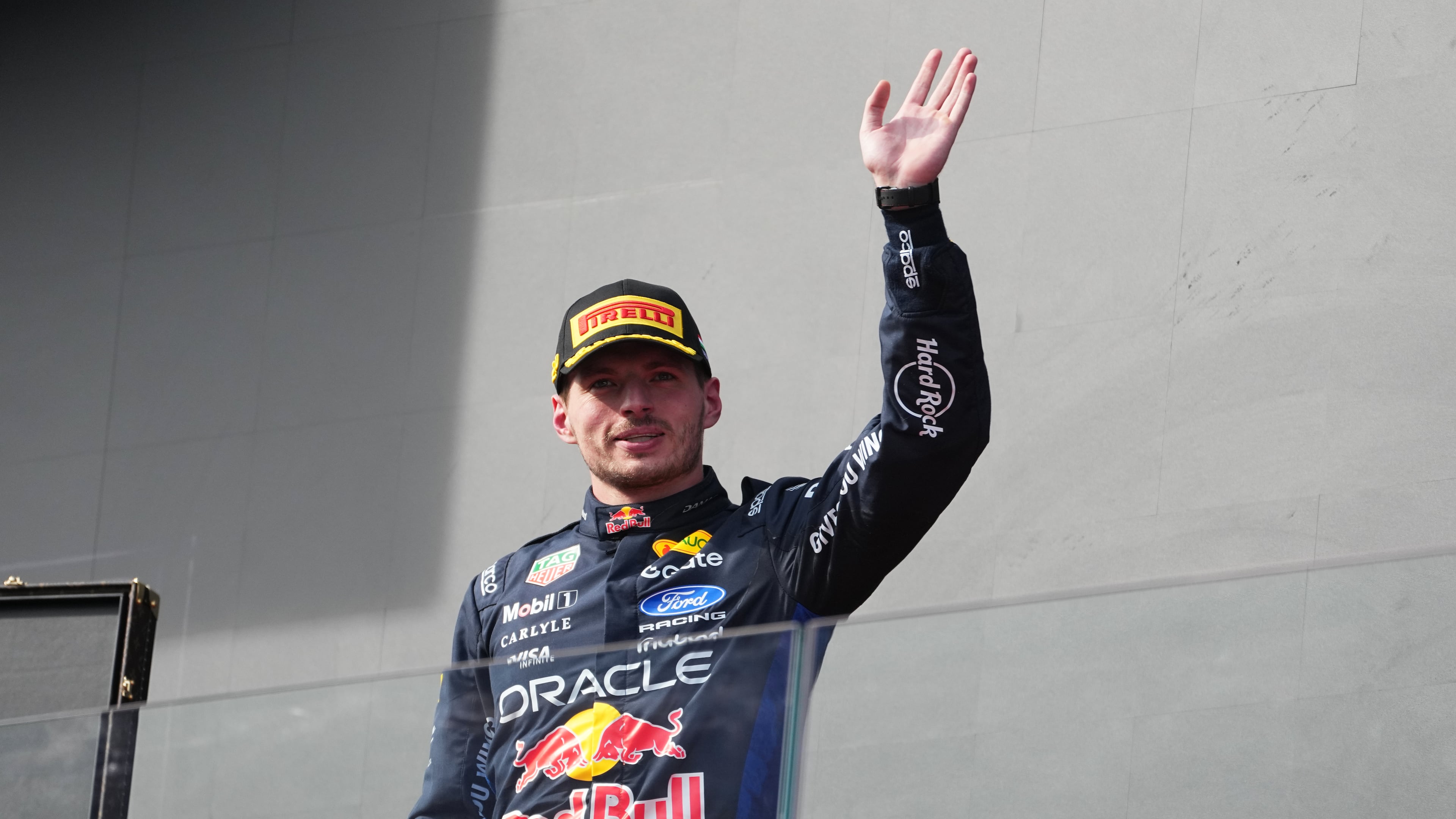 Second placed Red Bull driver Max Verstappen of the Netherlands waves after the Formula One Hungarian Grand Prix auto race, at the Hungaroring racetrack in Mogyorod, near Budapest, Hungary, Sunday, July 26, 2026. (AP Photo/Darko Vojinovic)