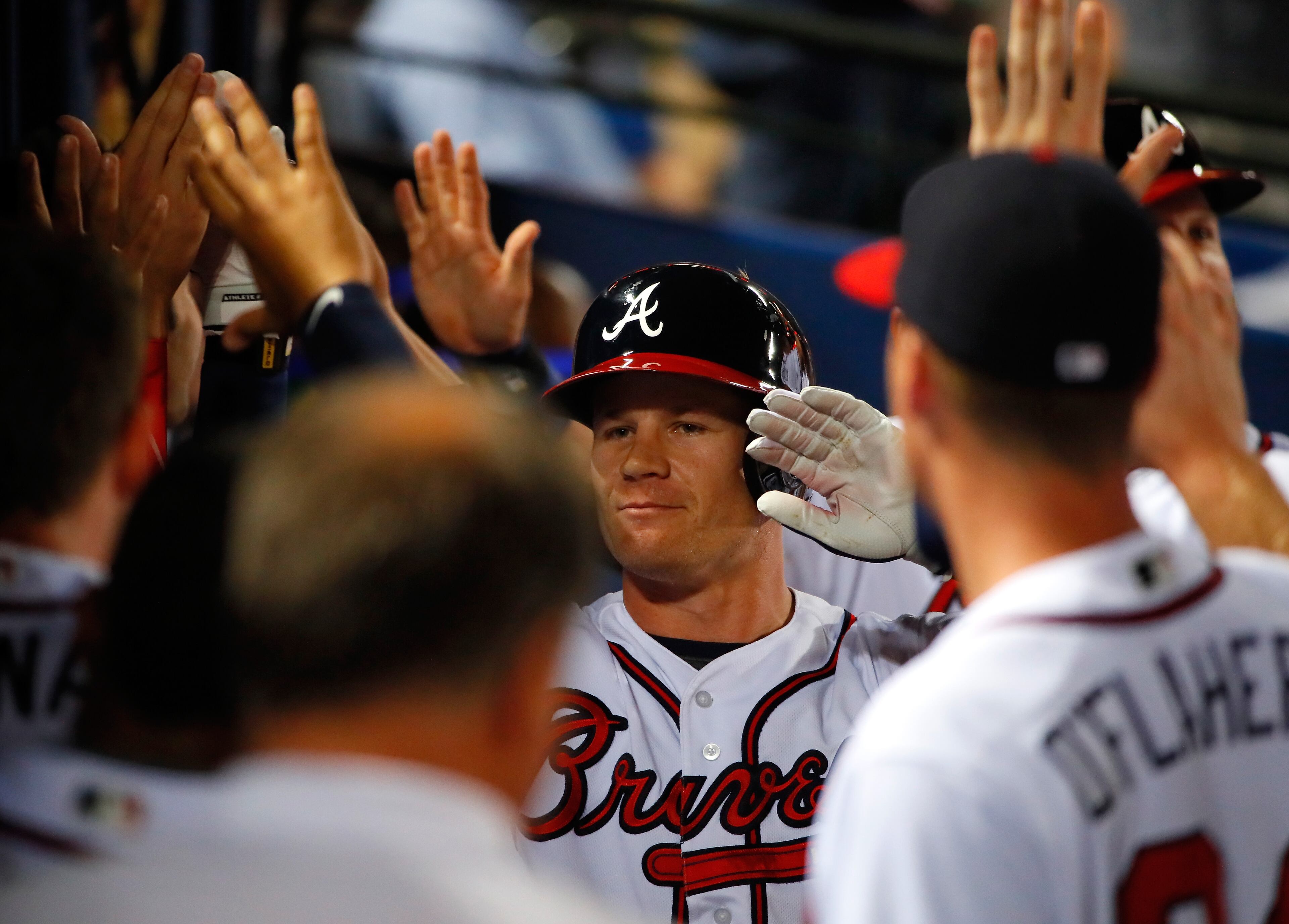 Gordon Beckham #7 of the Atlanta Braves celebrates his two-run homer in the sixth inning against the Milwaukee Brewers that scored A.J. Pierzynski #15 at Turner Field on May 25, 2016 in Atlanta, Georgia. (Photo by Kevin C. Cox/Getty Images)