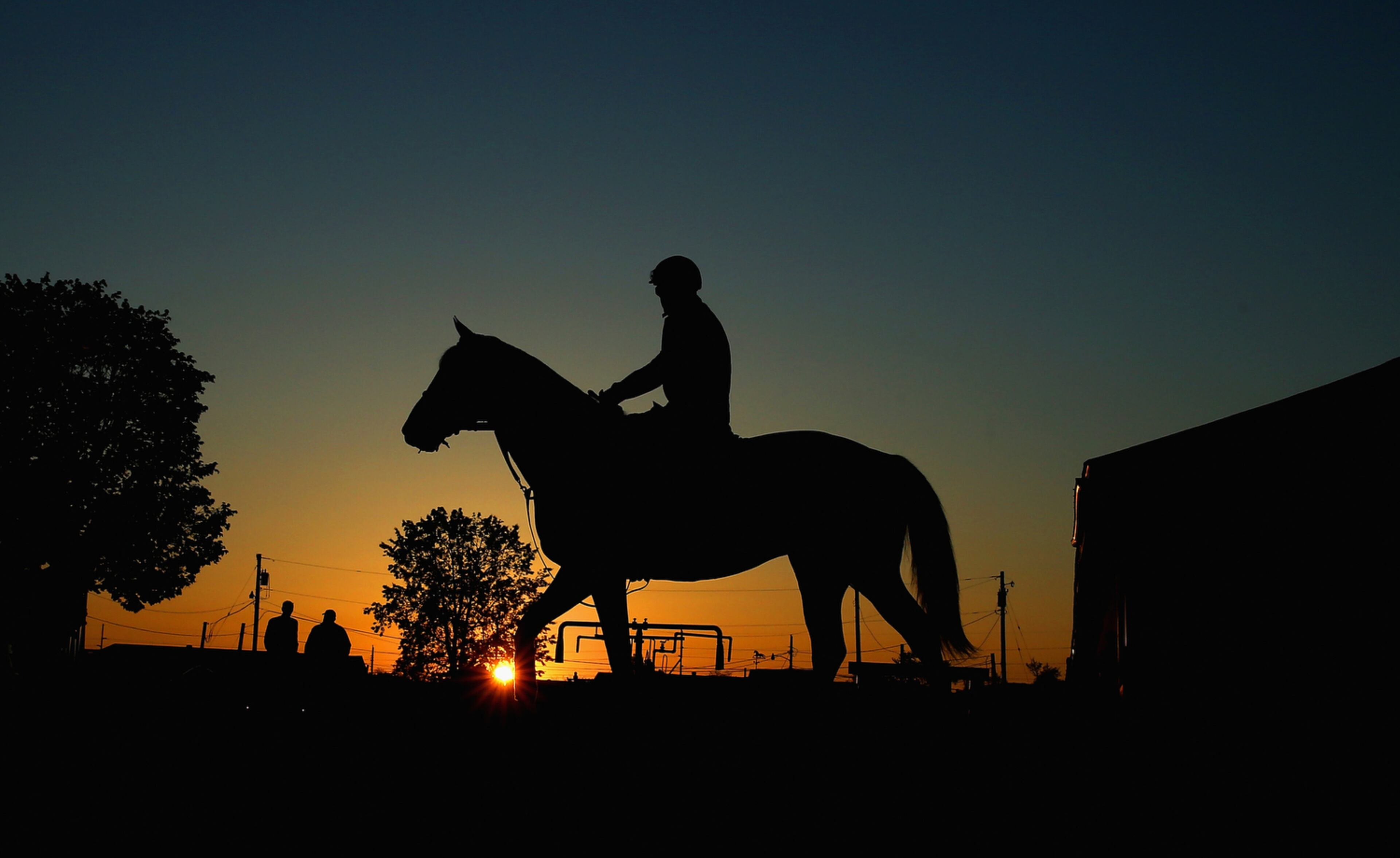 DAWN TRAINING SESSION--LOUISVILLE, KY - APRIL 27: Jockeys take horses to the track during the morning training for the Kentucky Derby at Churchill Downs on April 27, 2015 in Louisville, Kentucky. (Photo by Andy Lyons/Getty Images) *** BESTPIX ***