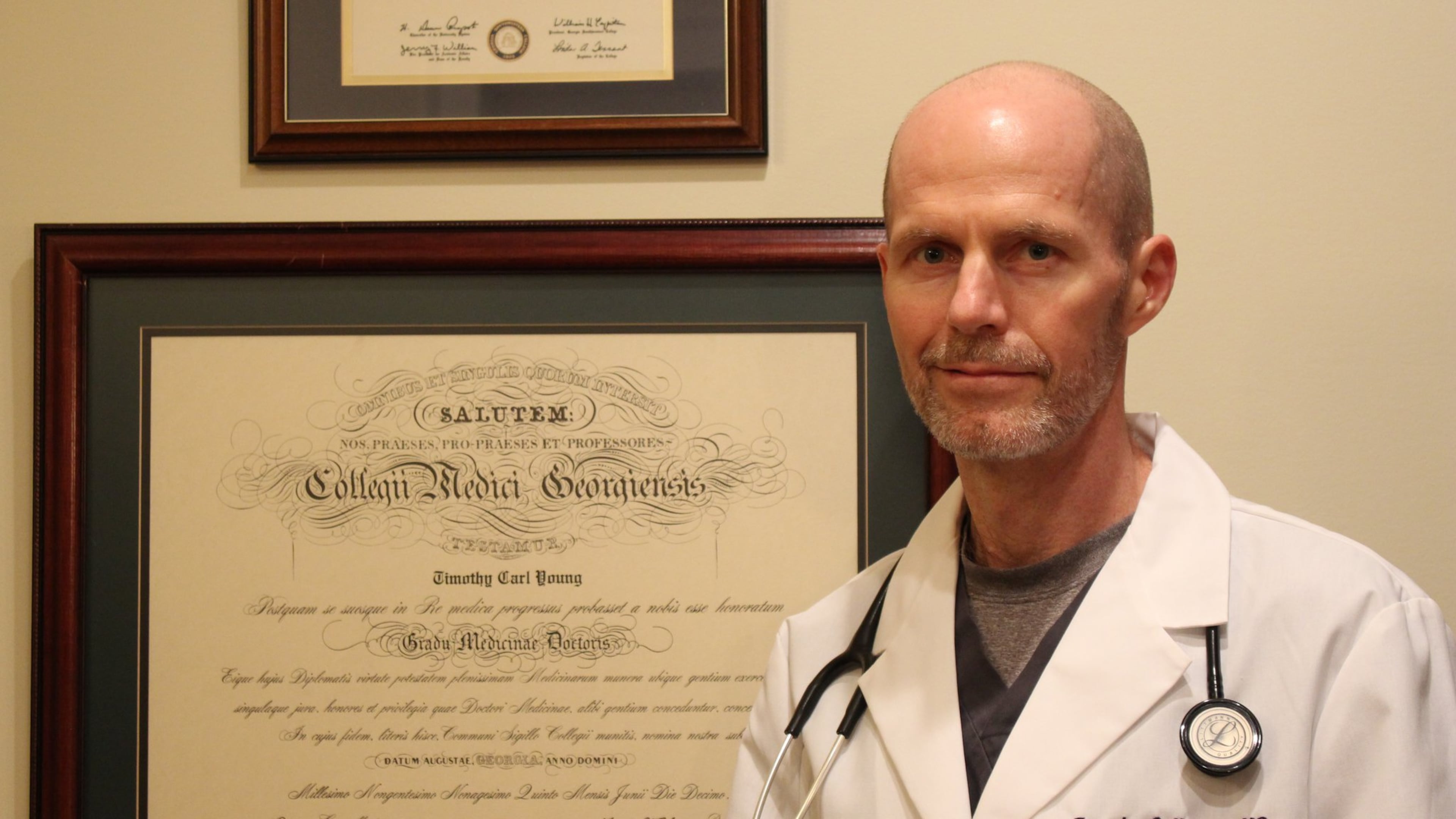 Dr. Timothy Young is resigning after working at Augusta State Medical Prison for 16 years. He said he is giving up the $191,000-a-year post because he faced hostility after raising concerns about security, sanitation and inmate care.