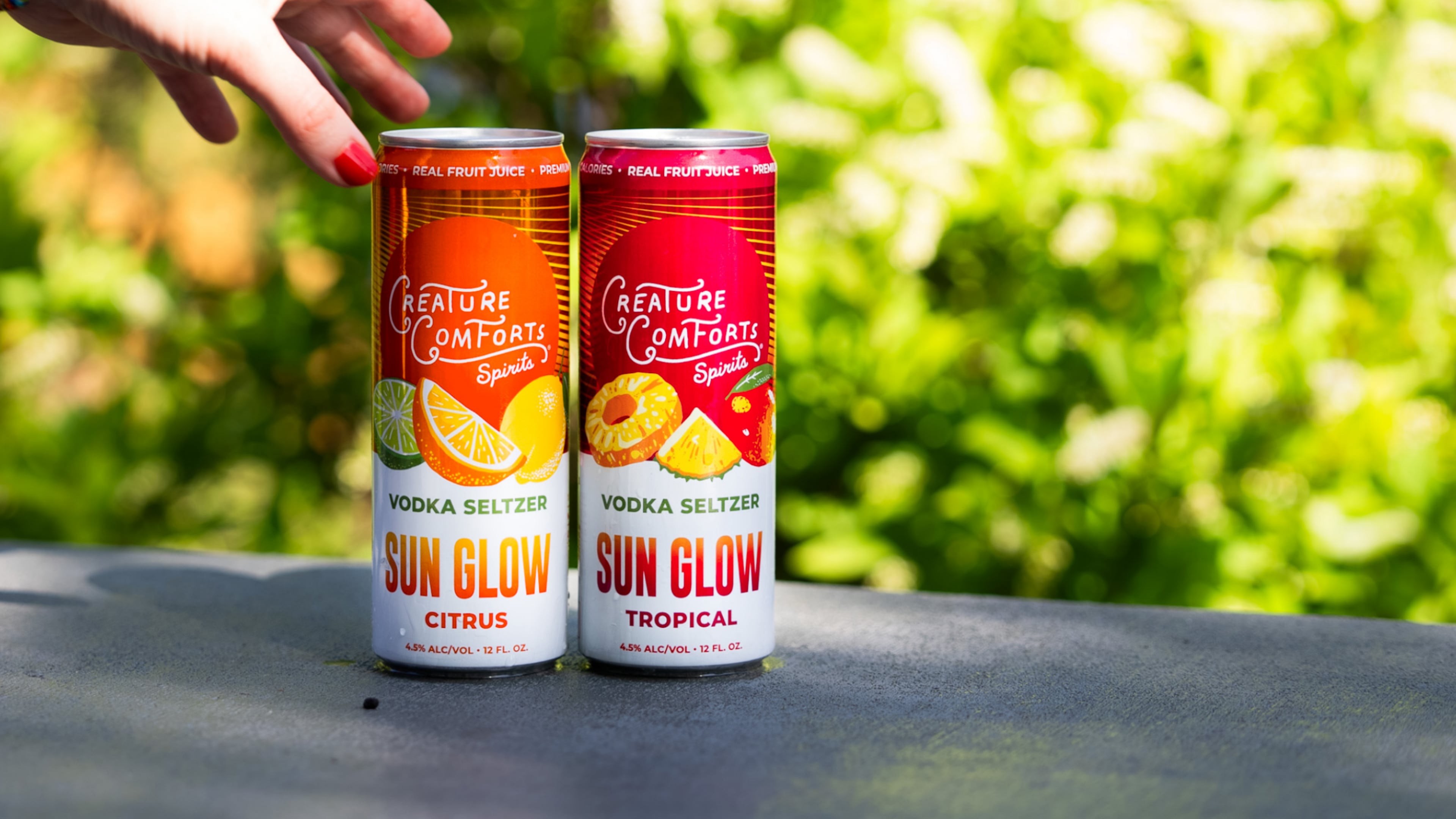 Sun Glow Citrus and Sun Glow Tropical are the first two flavors of canned vodka seltzers from Creature Comforts. (Courtesy of Creature Comforts)