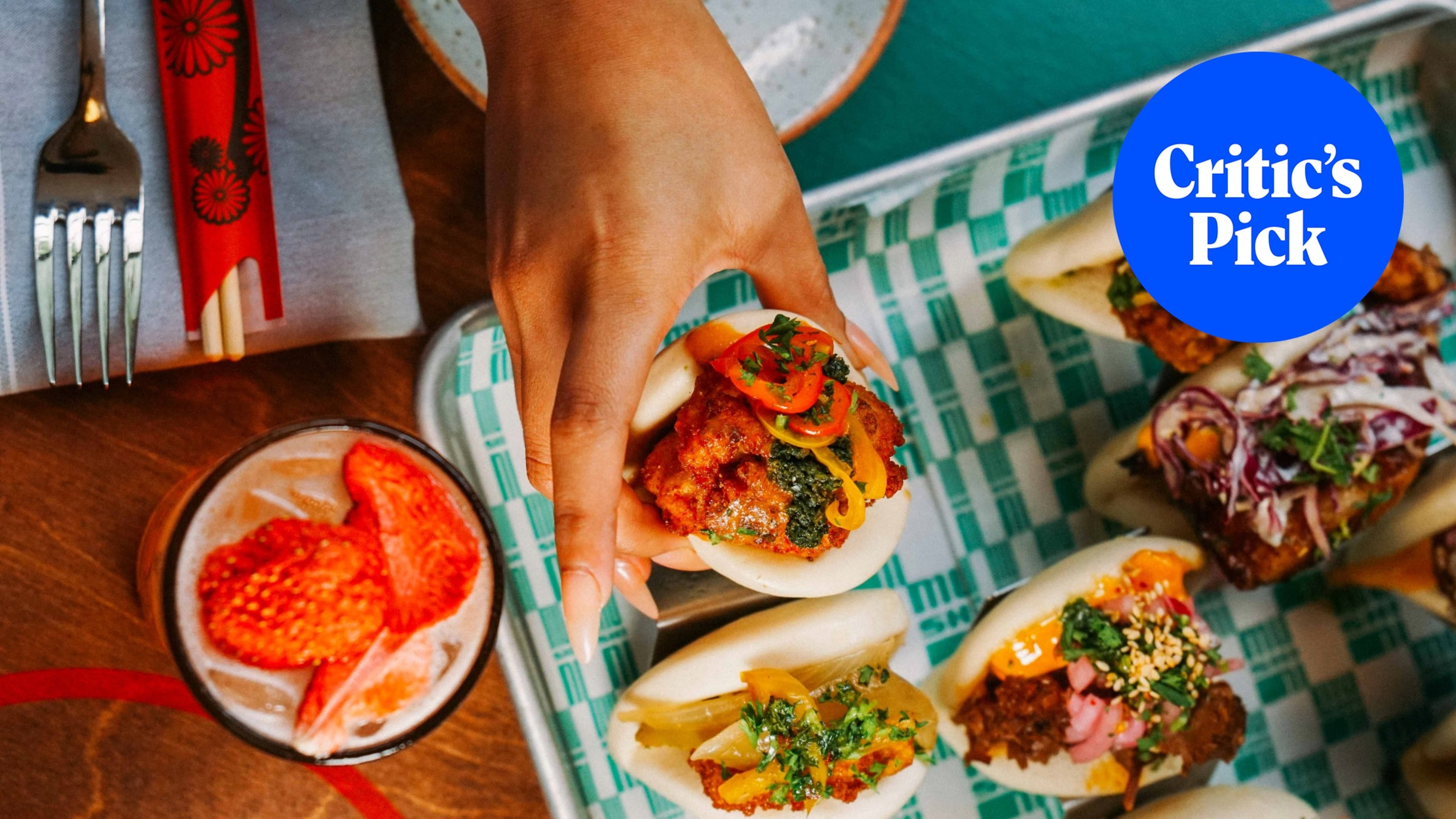 Bao buns at Mushi Ni in Inman Park, with a strawberry highball cocktail to the left. (Courtesy of Drew Perlmutter/Mushi Ni)