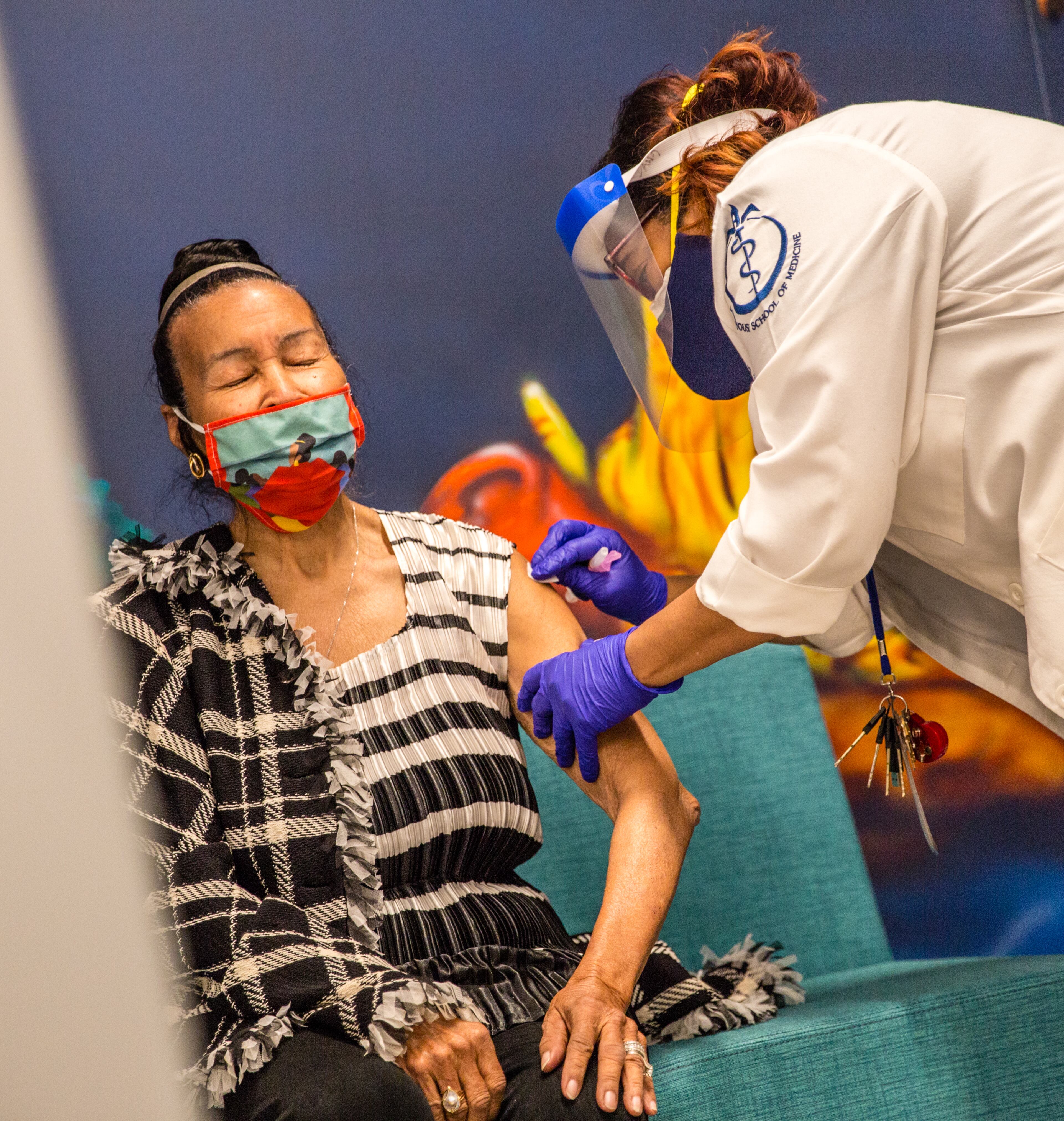 Xernona Clayton receives the first of two Moderna Covid-19 vaccines at Morehouse School of Medicine on Tuesday, January 5, 2021. (Jenni Girtman for The Atlanta Journal-Constitution)