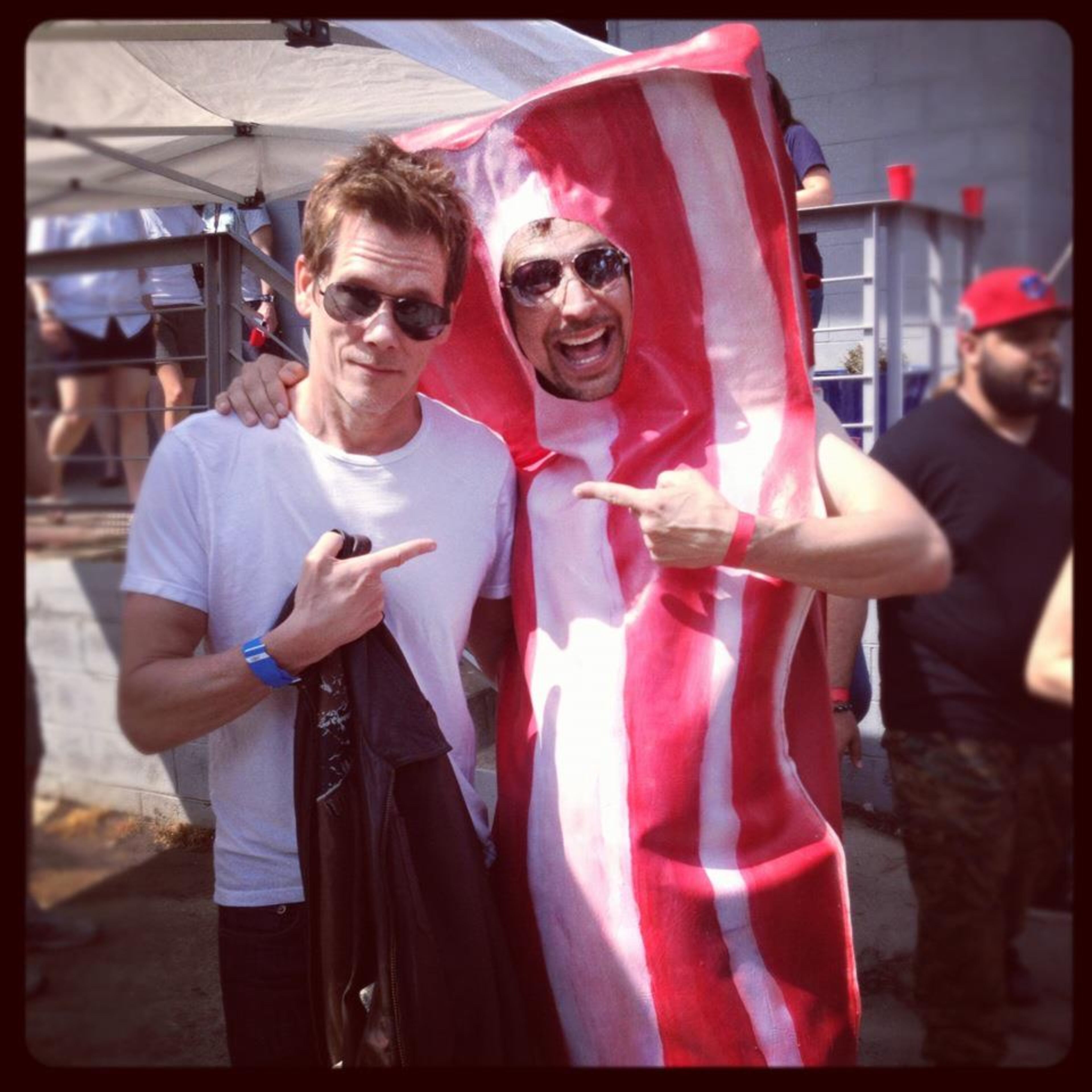 Kevin Bacon (left) and Dad's Garage regular Lucky Yates at BaconFest 2012, a fundraiser for the theater. Courtesy of Dad's Garage Theatre