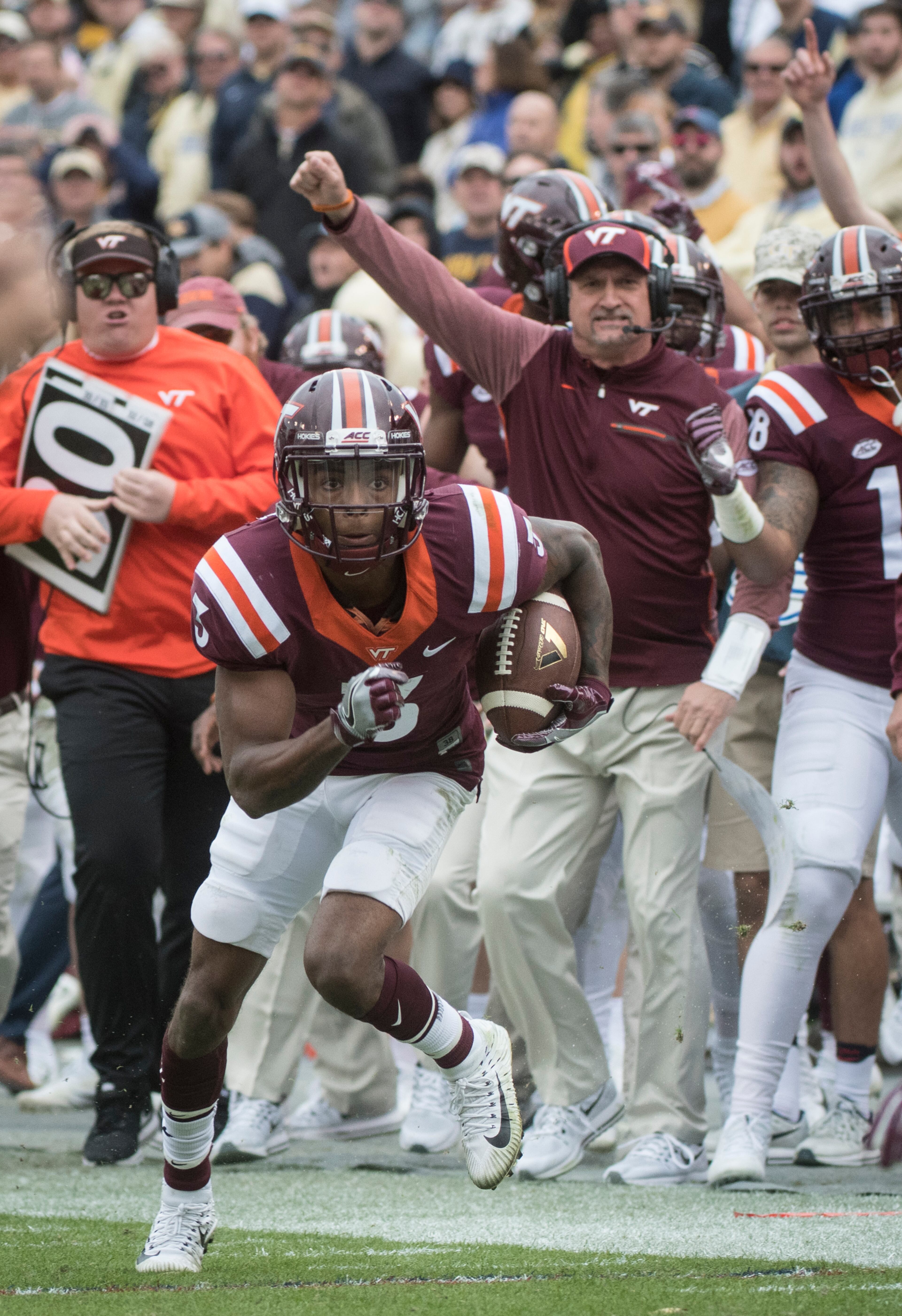 Virginia Tech cornerback Greg Stroman (3) runs with his interception on the way to a touchdown during the second half of a football game against Georgia Tech on Saturday, Nov.11, 2017, in Atlanta. (Photo/John Amis)