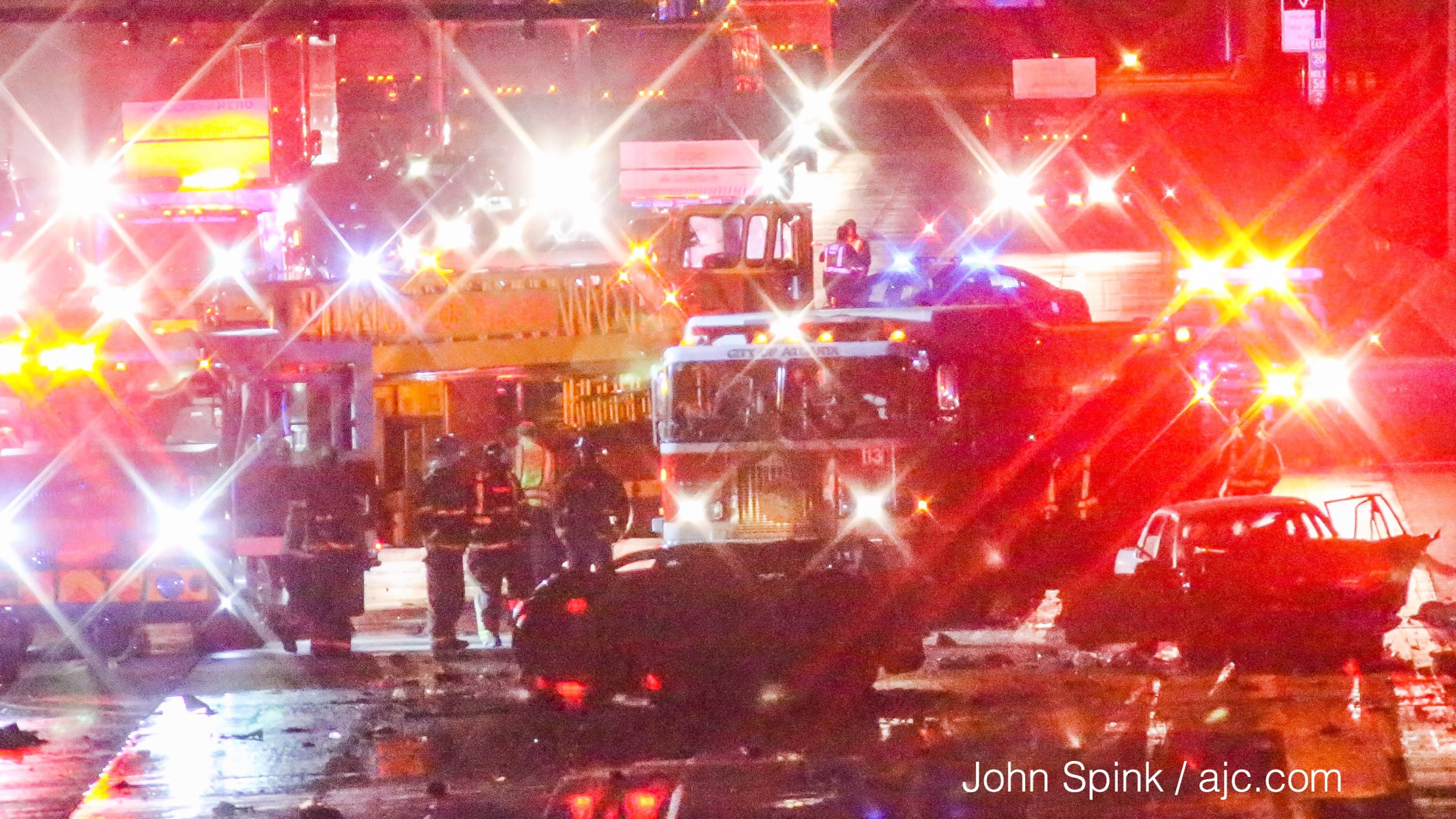 A deadly multi-vehicle crash blocked several lanes on I-20 near Hill Street on Monday morning. JOHN SPINK / JSPINK@AJC.COM