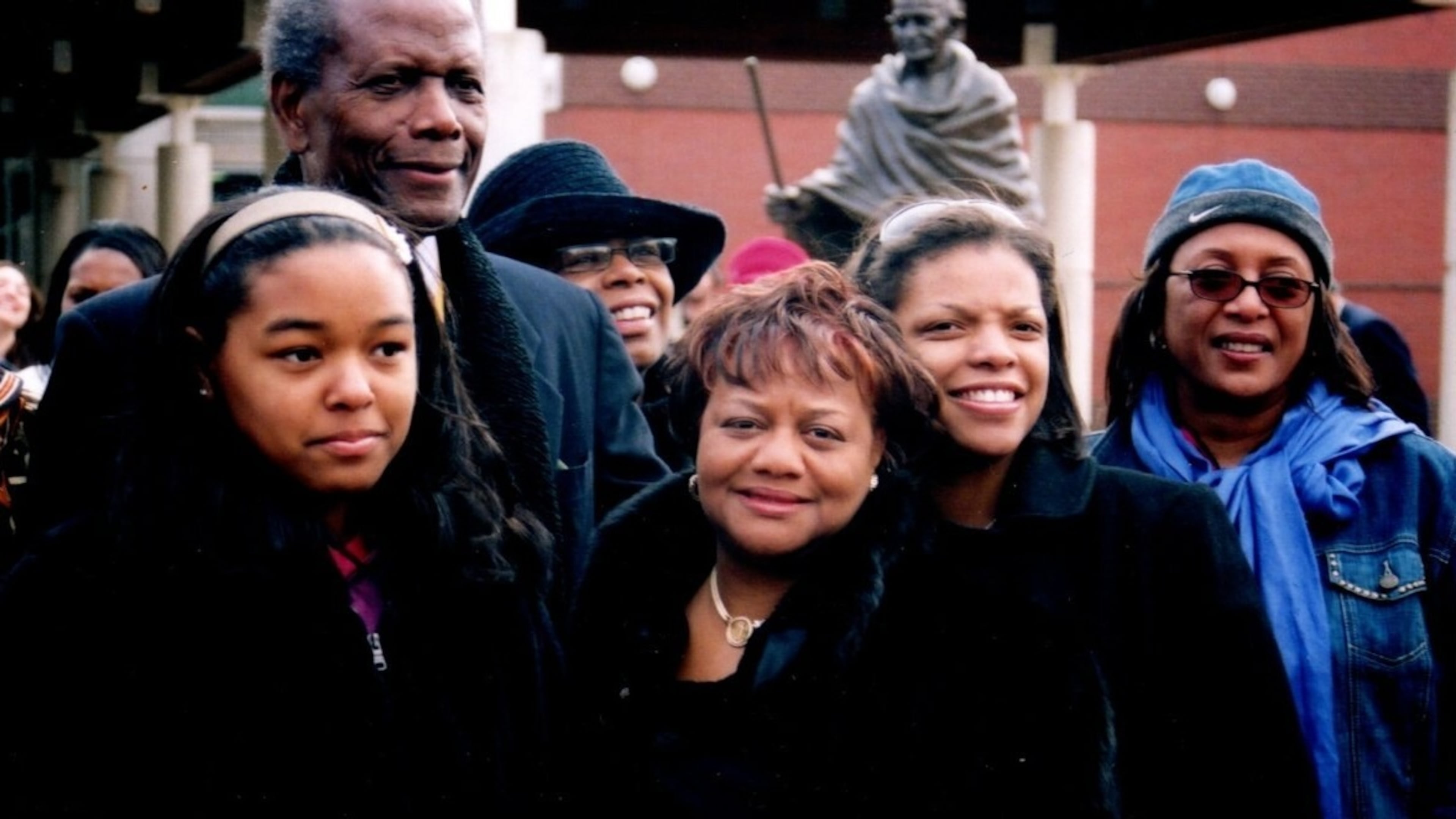 Sidney Poitier poses for a photo with family members Guylaine Gouraige, Beverly Henderson, Constance Wilson, Aisha LaBarrie and Vanesta Poitier during a dedication ceremony for his marker on the International Civil Rights Walk of Fame in 2007.