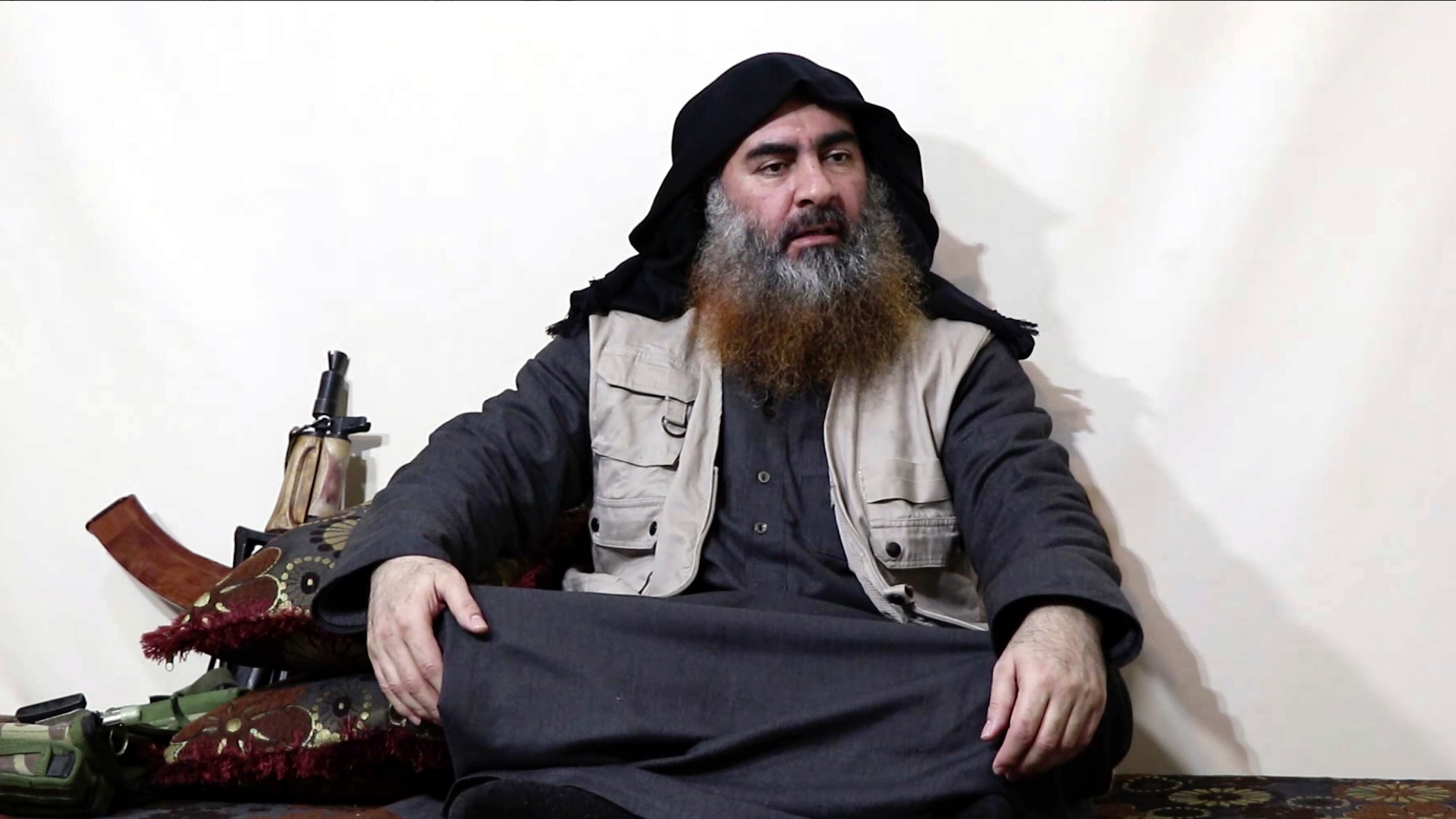 This file image made from video posted on a militant website April 29, 2019, shows the leader of the Islamic State group, Abu Bakr al-Baghdadi, being interviewed by his group's Al-Furqan media outlet.