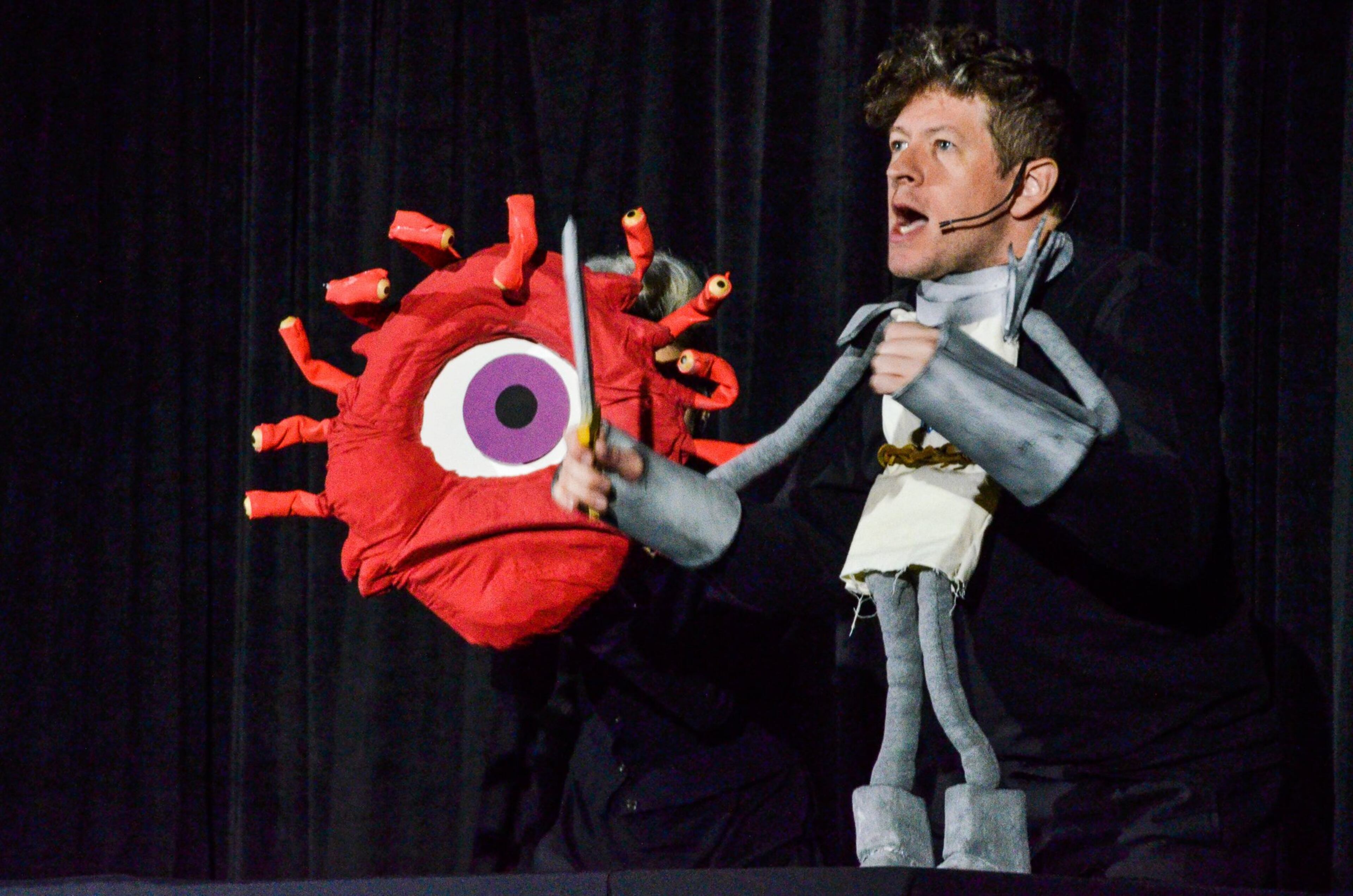 Puppeteers Broderick Jones and Katie Correll perform Paladin and Beholder, respectively, during a Dragon Con Late Night Puppet Slam performance. CONTRIBUTED BY BRIAN BROWN