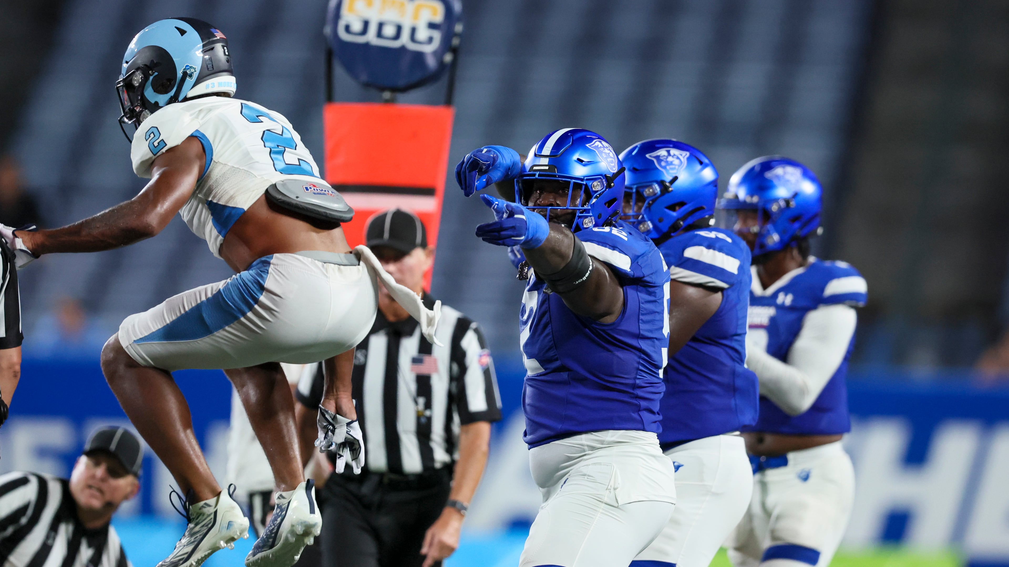 Georgia State offensive tackle Travis Glover (52) celebrates a first down after Georgia State running back Marcus Carroll (not pictured) converted a 4th and 1 to secure their win during the second half against Rhode Island at Center Parc Stadium, Thursday, August 31, 2023, in Atlanta. Georgia State won 42-35. (Jason Getz / Jason.Getz@ajc.com)