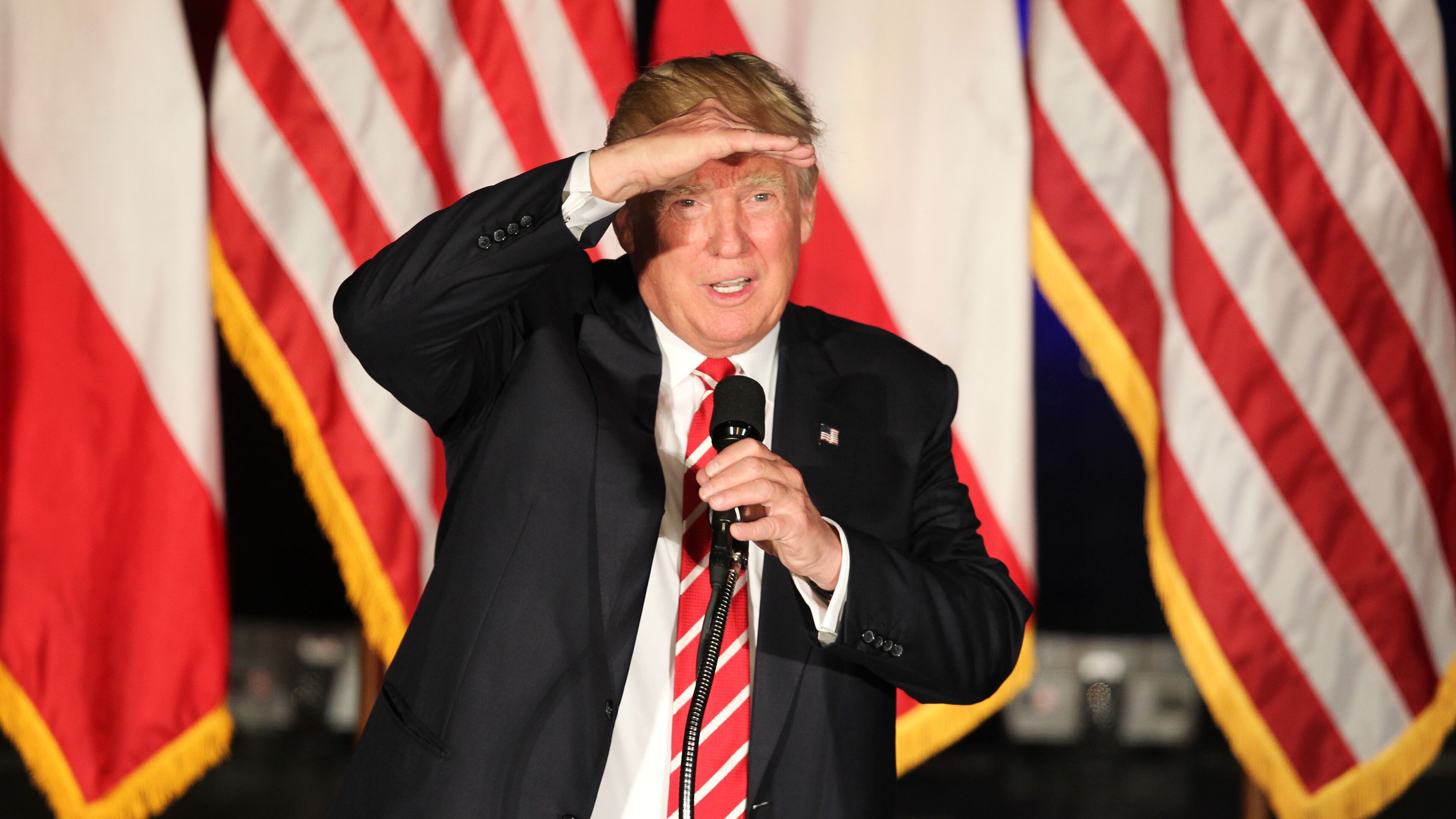 Donald Trump peers into the crowd at the Fox Theatre on Wednesday afternoon at a rally in downtown Atlanta. Emily Jenkins, ejenkins@ajc.com