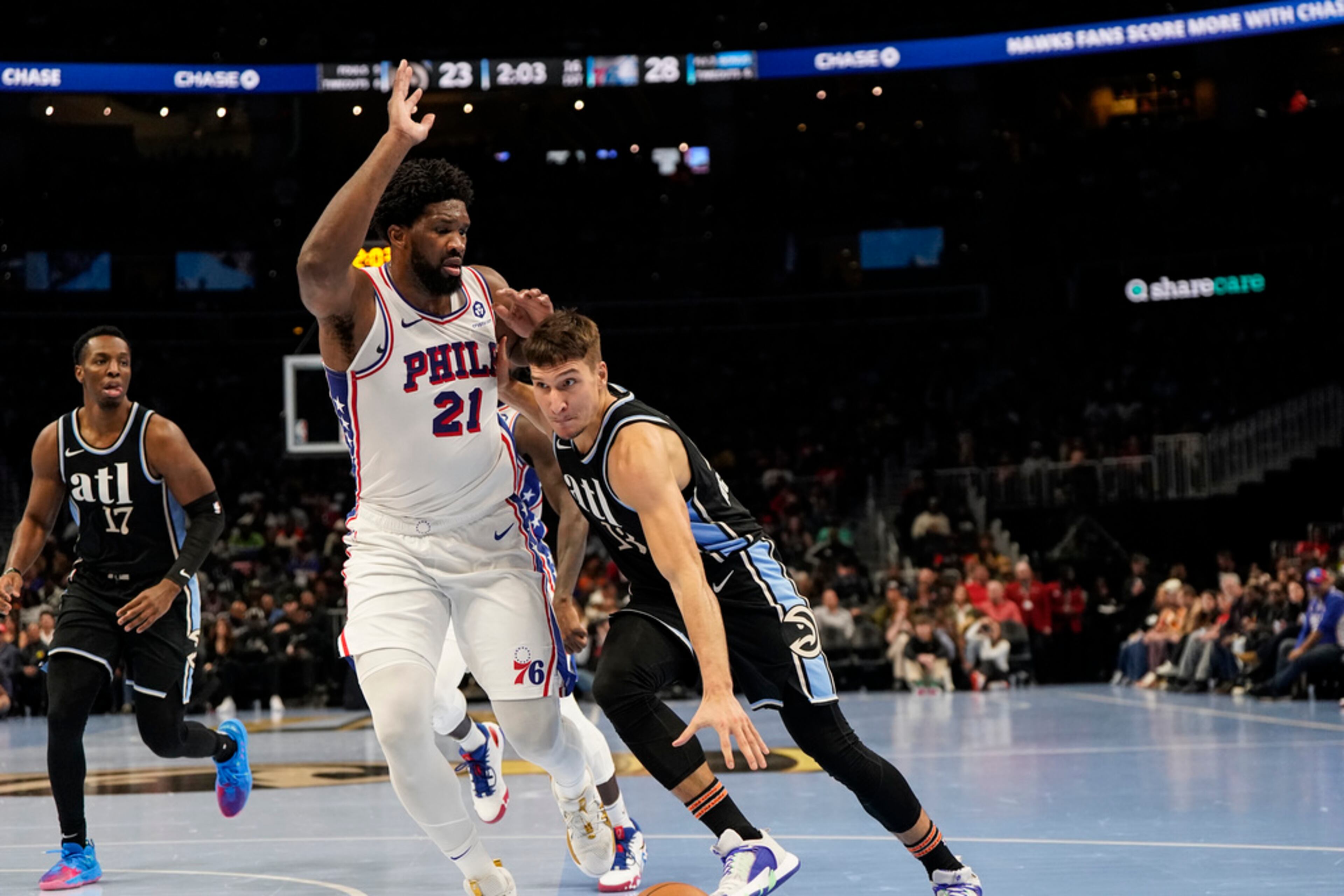 Atlanta Hawks guard Bogdan Bogdanovic (13) during the first half of an In-Season Tournament NBA basketball game, Friday, Nov. 17, 2023, in Atlanta. (AP Photo/Mike Stewart)
