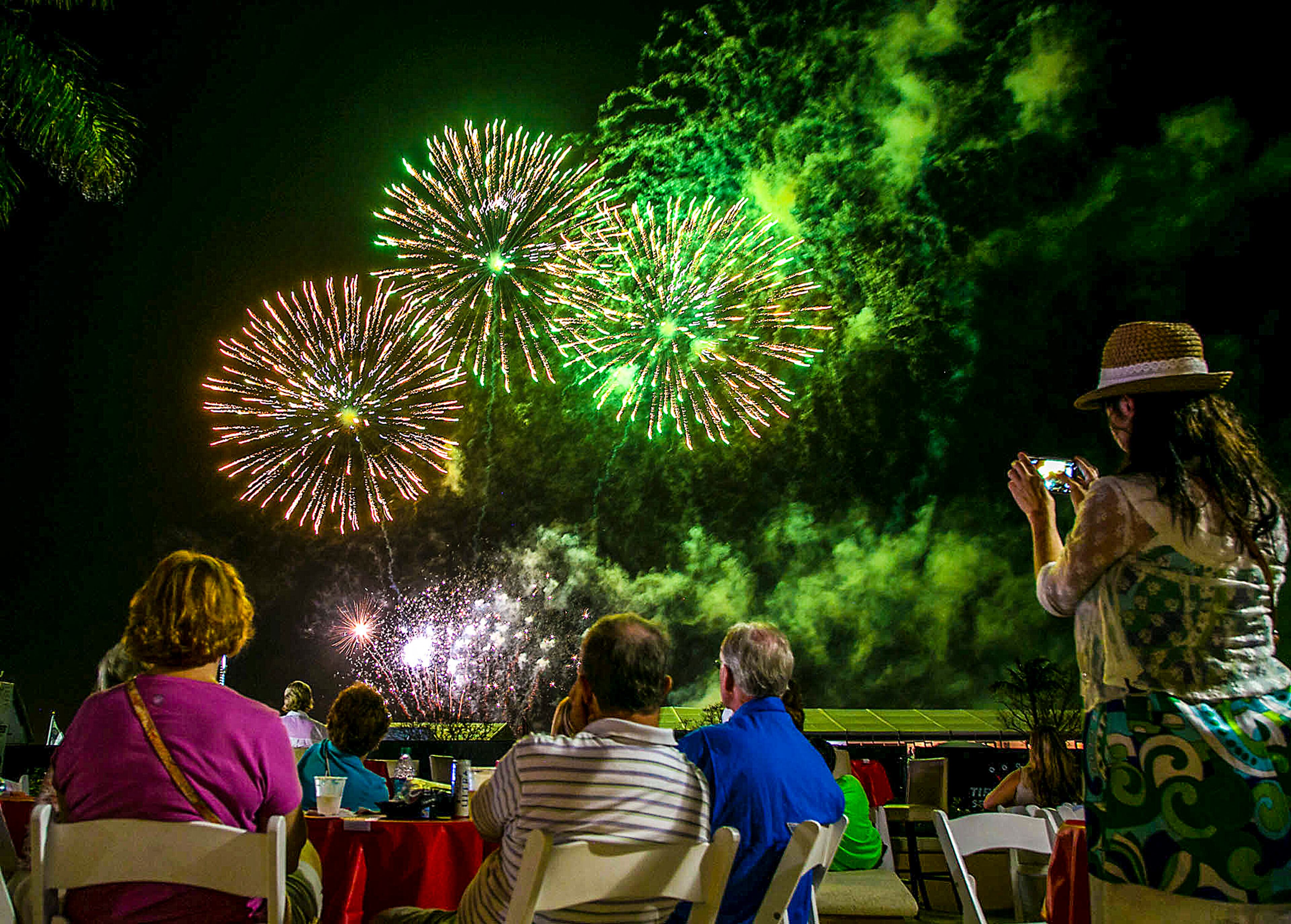 Fireworks explode over the grandstands surrounding the 18th hole after the conclusion of golf at the Honda Classic at PGA National in Palm Beach Gardens, Florida on March 1, 2015. (Allen Eyestone / The Palm Beach Post)