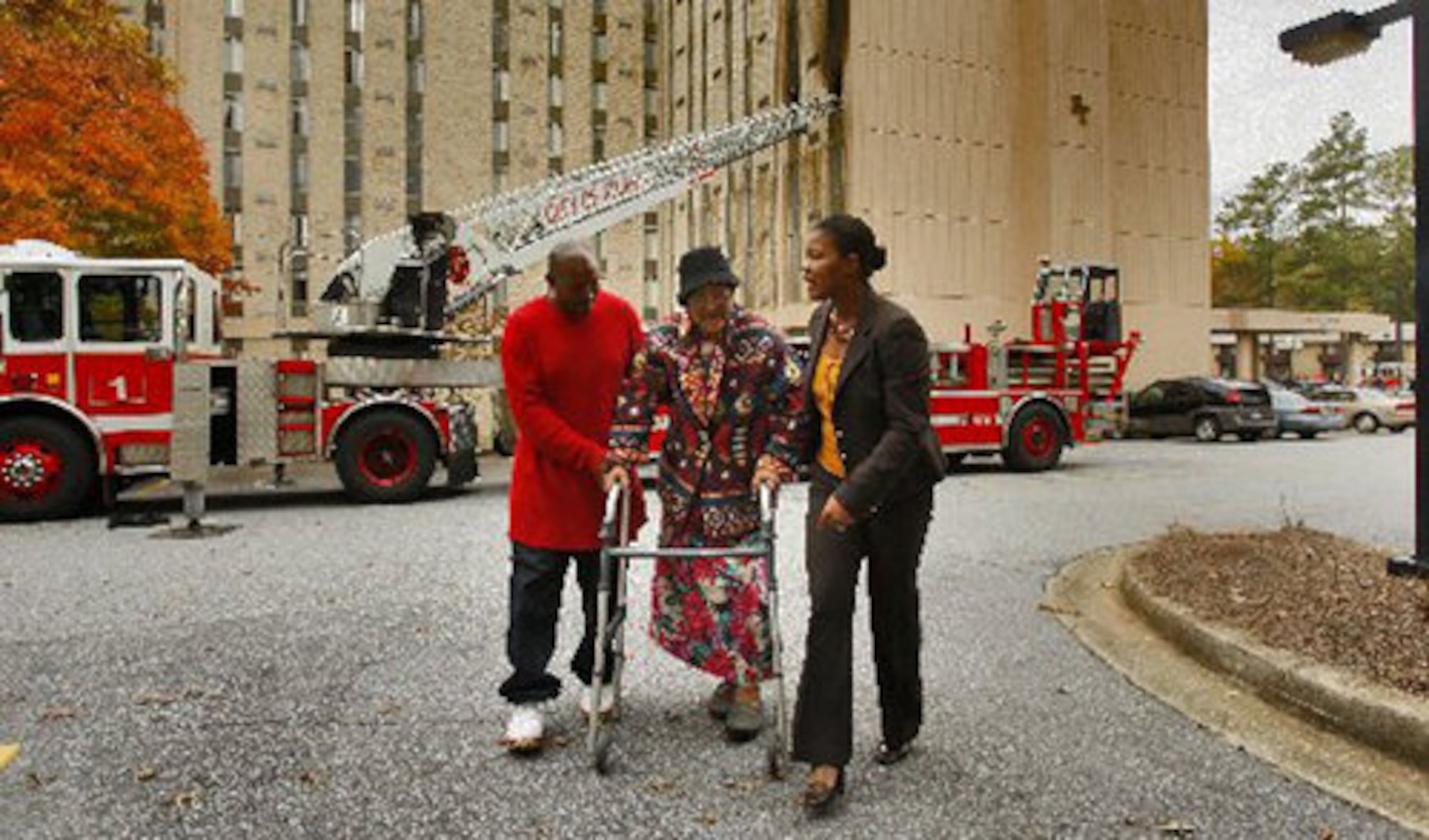 Residents of Baptist Towers were being moved into chairs in the parking lot.