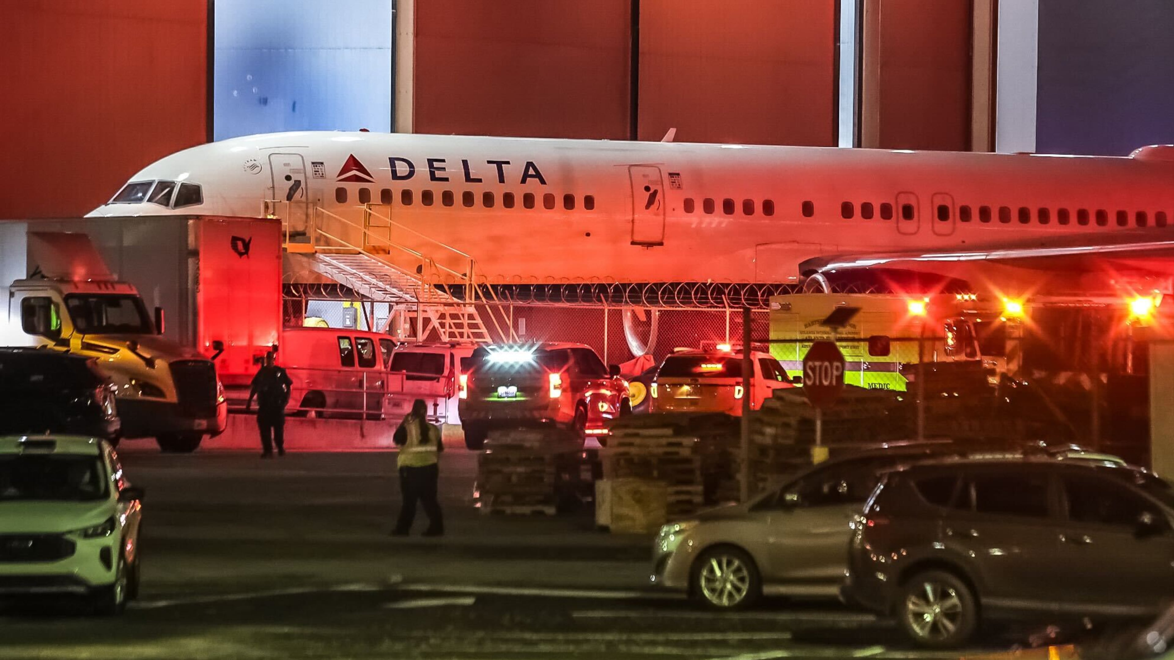 Emergency vehicles responded to the scene at a Delta Air Lines facility at Hartsfield-Jackson International Airport on Tuesday. (John Spink / John.Spink@ajc.com)