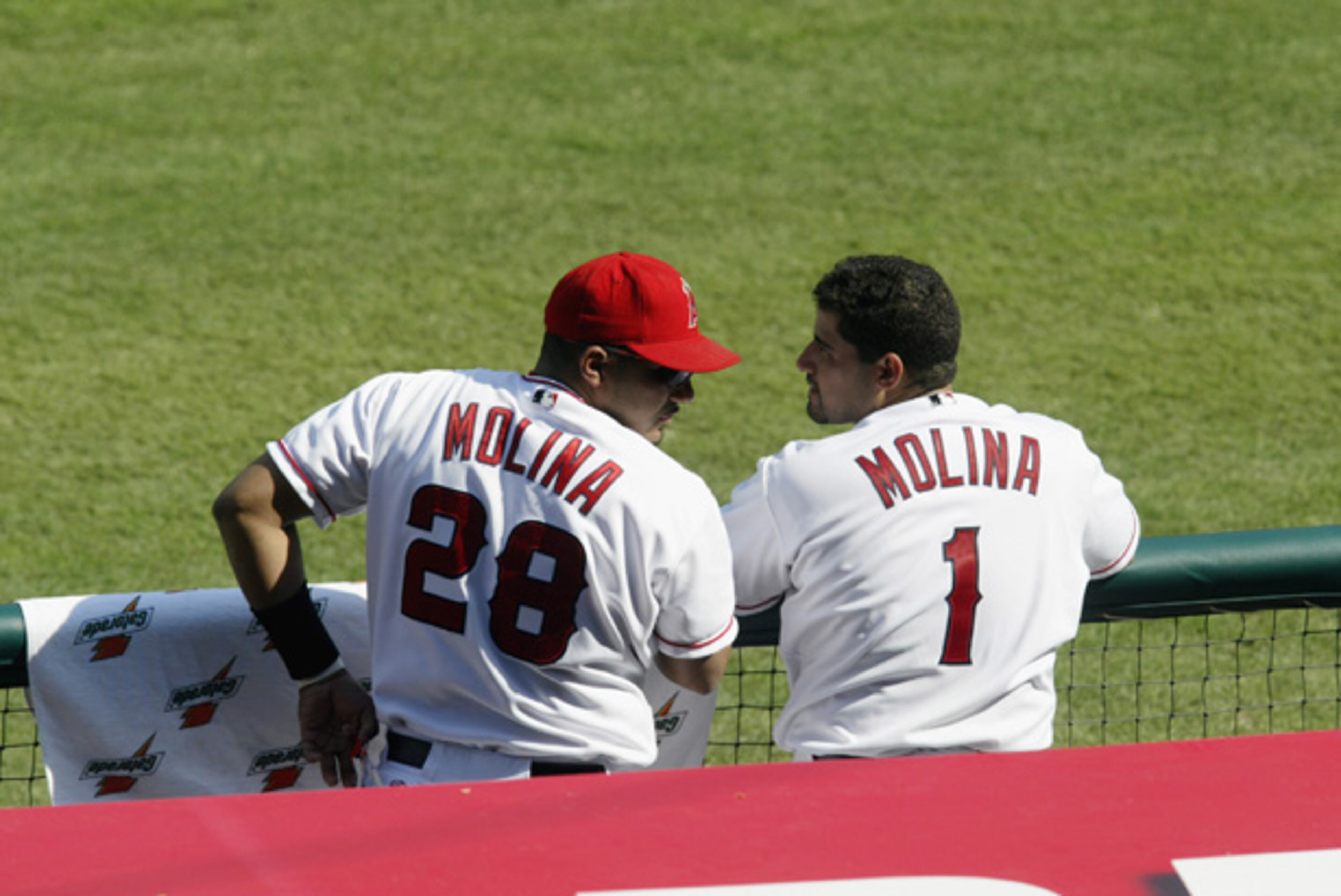 Brothers Jose Molina (28) and Bengie Molina played catcher for the Los Angeles Angels of Anaheim for three seasons. A third brother, Yadier Benjamin Molina, currently plays with the Cardinals. All three have won a World Series.