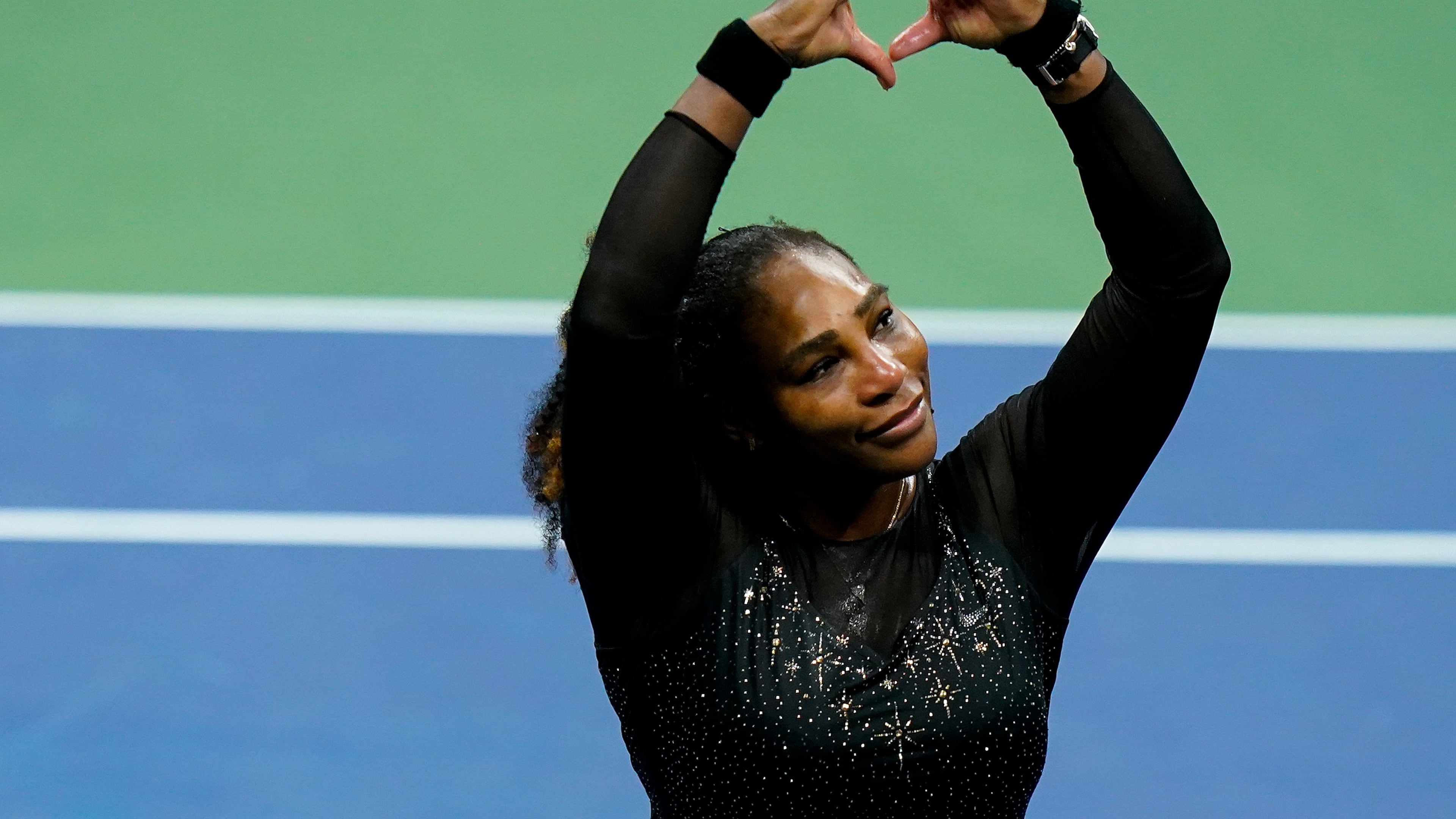 FILE - Serena Williams motions a heart to fans during the third round of the U.S. Open tennis championships, Sept. 2, 2022, in New York. (AP Photo/Frank Franklin II, file)