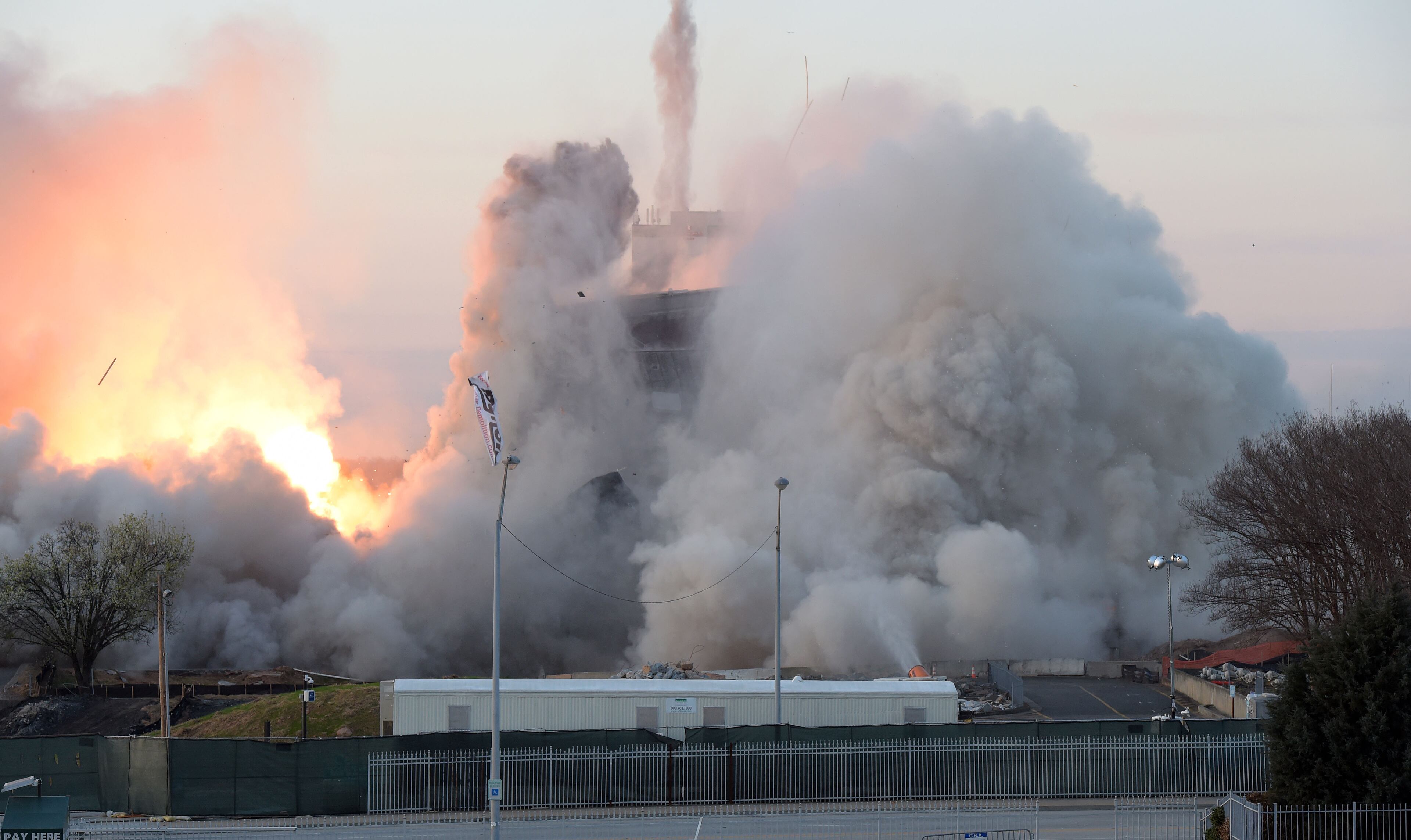 MARCH 5, 2017 7:05:10 AM ATLANTA A fireball erupts as demolition crews bring down the old state archives building in a controlled implosion shortly after 7 am Sunday, March 5, 2017. The 14 story state archives building was about 50 years old and was imploded to make way for a new state courts building. Gov. Deal has budgeted about $105 million in next year's budget for the new state courts building. Kent D. Johnson/AJC