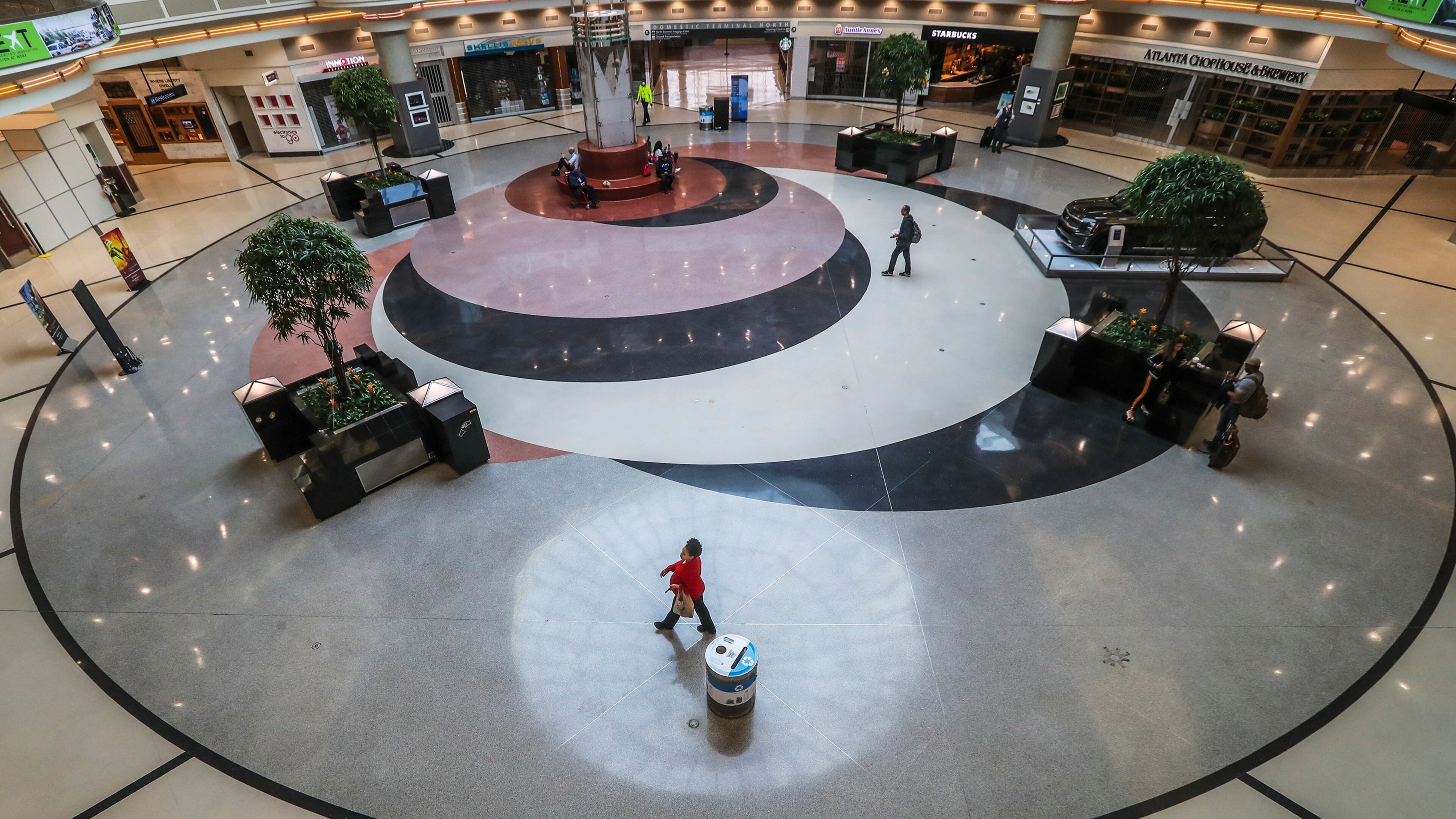 Hartsfield-Jackson International Airport was nearly empty in early April 2020. The year will be remembered for the enormous loss and disruption that the pandemic brought. (JOHN SPINK/JSPINK@AJC.COM)