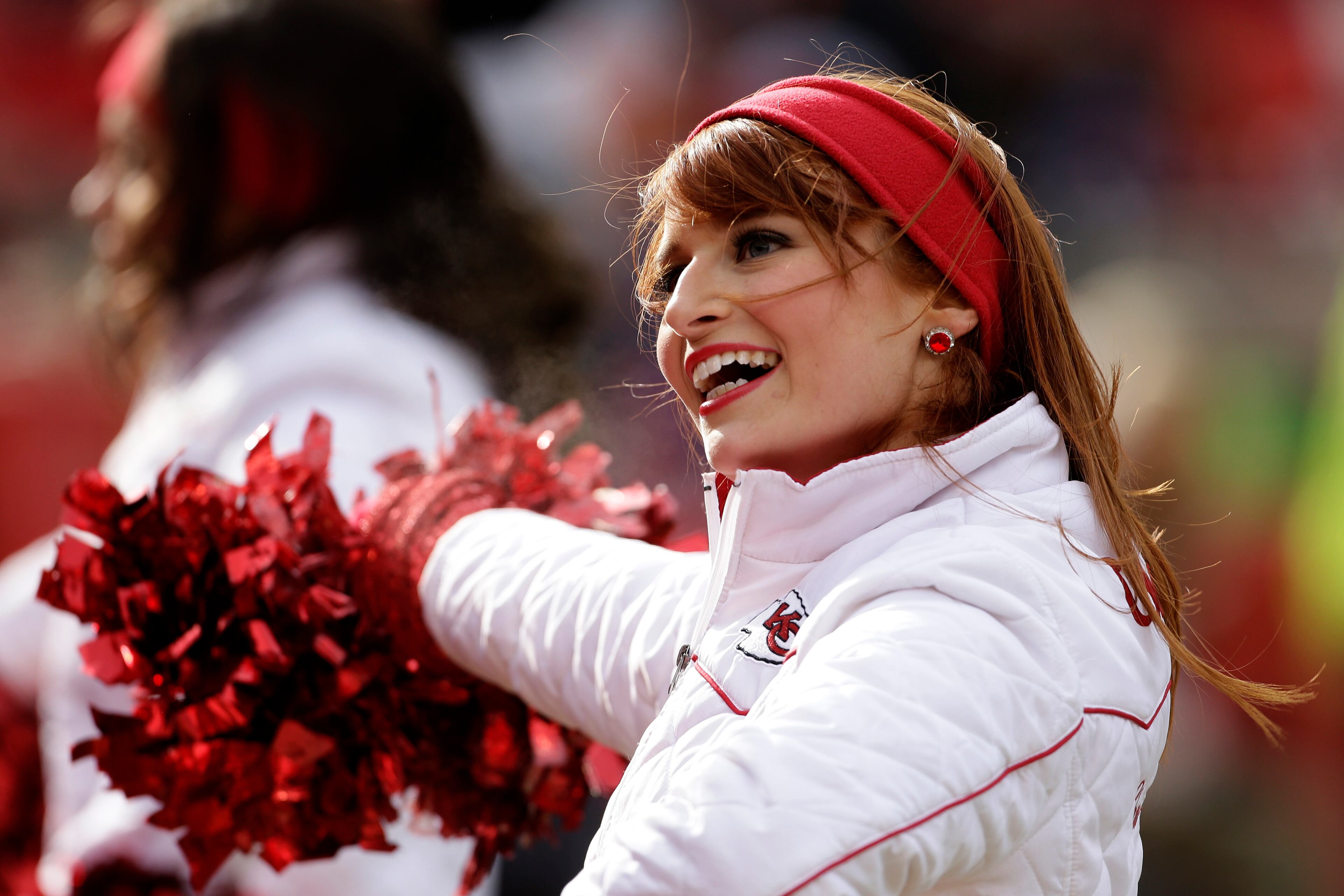 A Kansas City Chiefs cheerleader performs during the first half of an NFL football game against the San Diego Chargers Sunday, Nov. 24, 2013, in Kansas City, Mo. (AP Photo/Charlie Riedel)