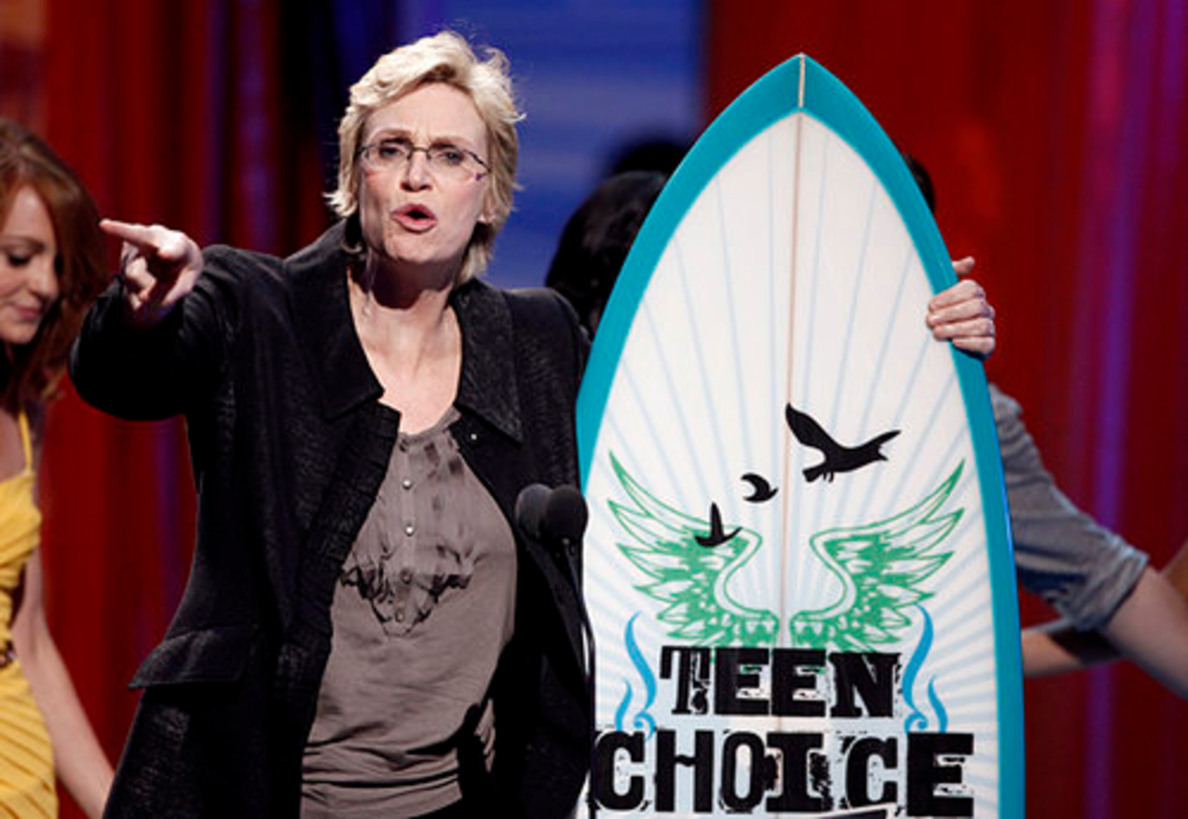 Jane Lynch of "Glee" accepts a comedy award.