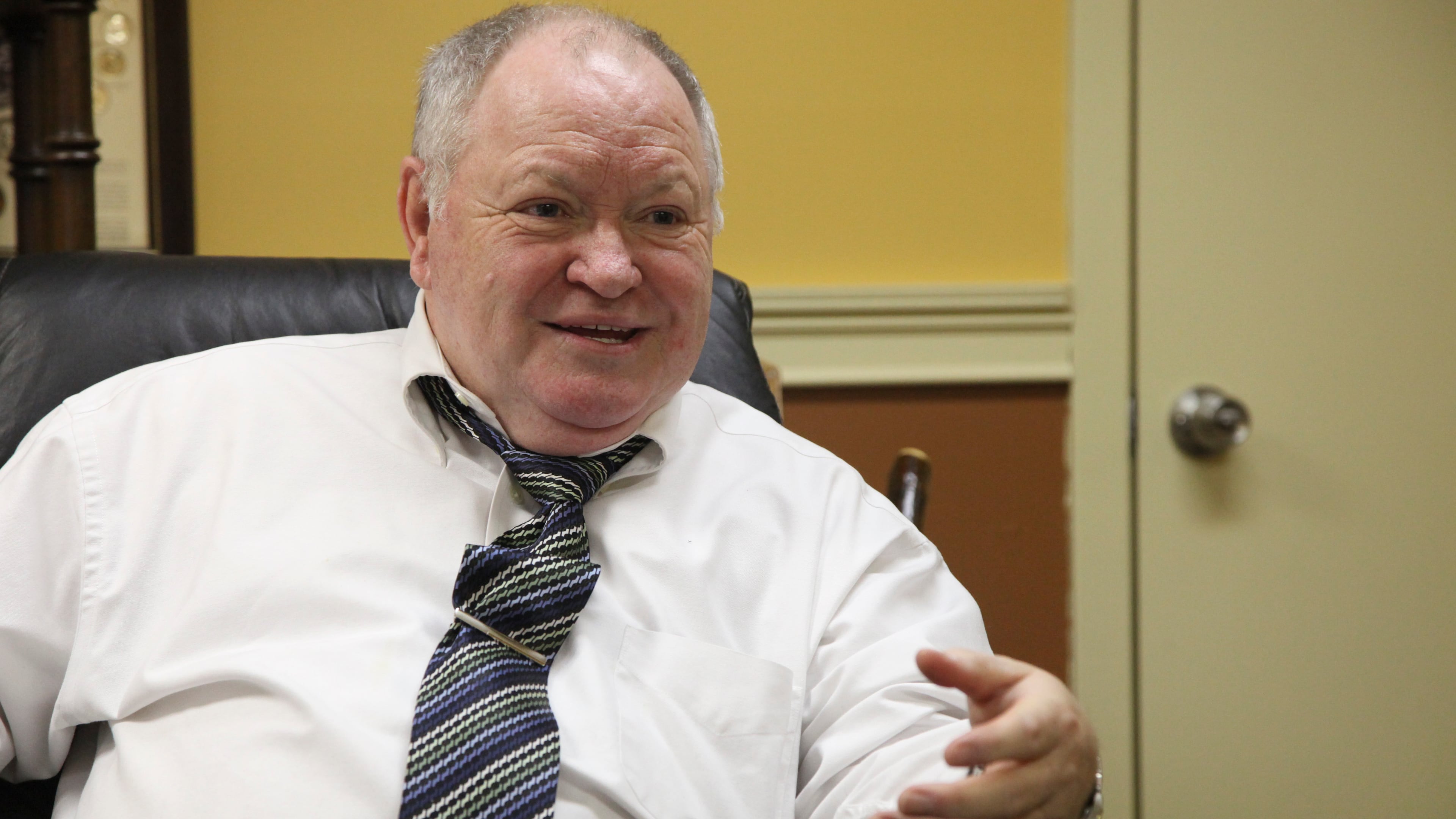 FILE - In this December 2009 file photo, James T. Reynolds Sr., president of the Cancer Fund of America, speaks in Knoxville, Tenn. Reynolds' two Tennessee-based cancer charities have been labeled "shams" by the Federal Trade Commission and have settled a massive fraud case by agreeing to a $75.8 million judgment and the dissolution of the businesses. The settlement with Reynolds, Cancer Fund of America and Cancer Support Services was filed Wednesday, March 30, 2016, in federal court in Arizona.(Adam Brimer/Knoxville News Sentinel, via AP, File)