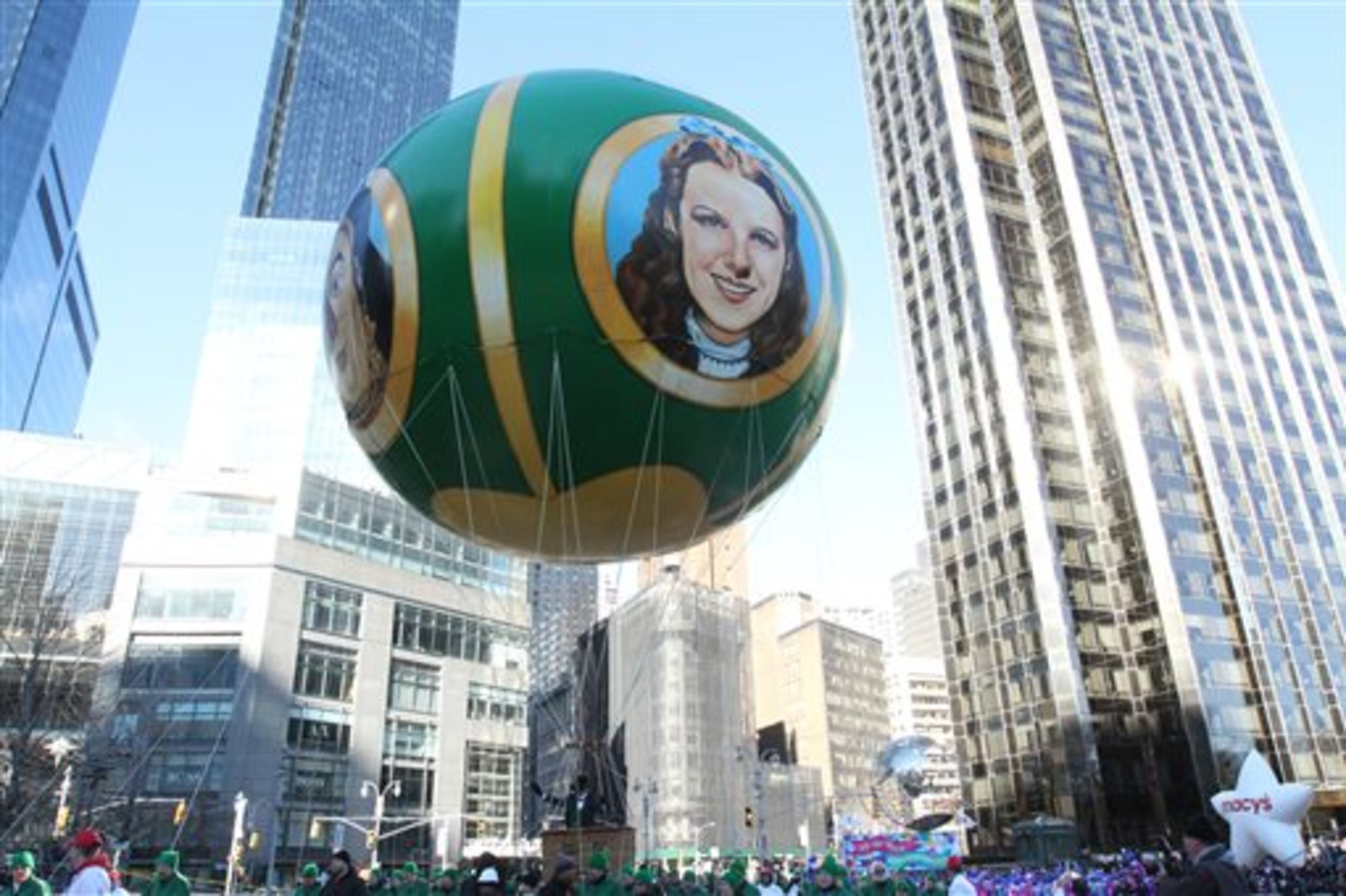 The Wizard of Oz balloon makes it way through New York's Columbus Circle during the Macy's Thanksgiving Day Parade Thursday Nov. 28, 2013. (AP Photo/Tina Fineberg)