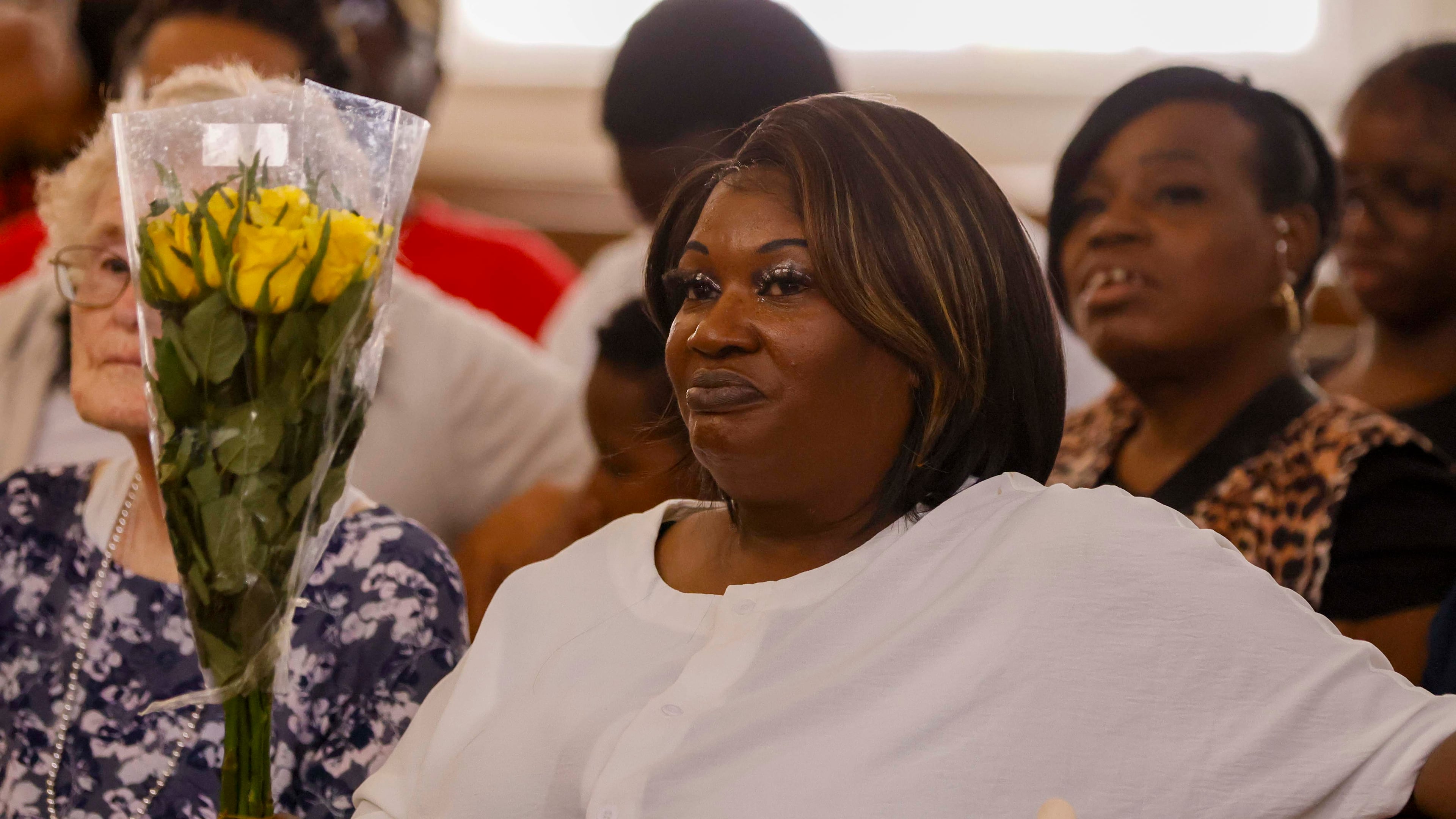 April Newkirk and her family celebrate the life of Newkirk's daughter, Adriana Smith, at Park Avenue Baptist Church on Sunday. Smith was declared brain dead months ago, but the state’s abortion law has prevented doctors from removing her from life support because she's pregnant.
(Miguel Martinez/AJC)