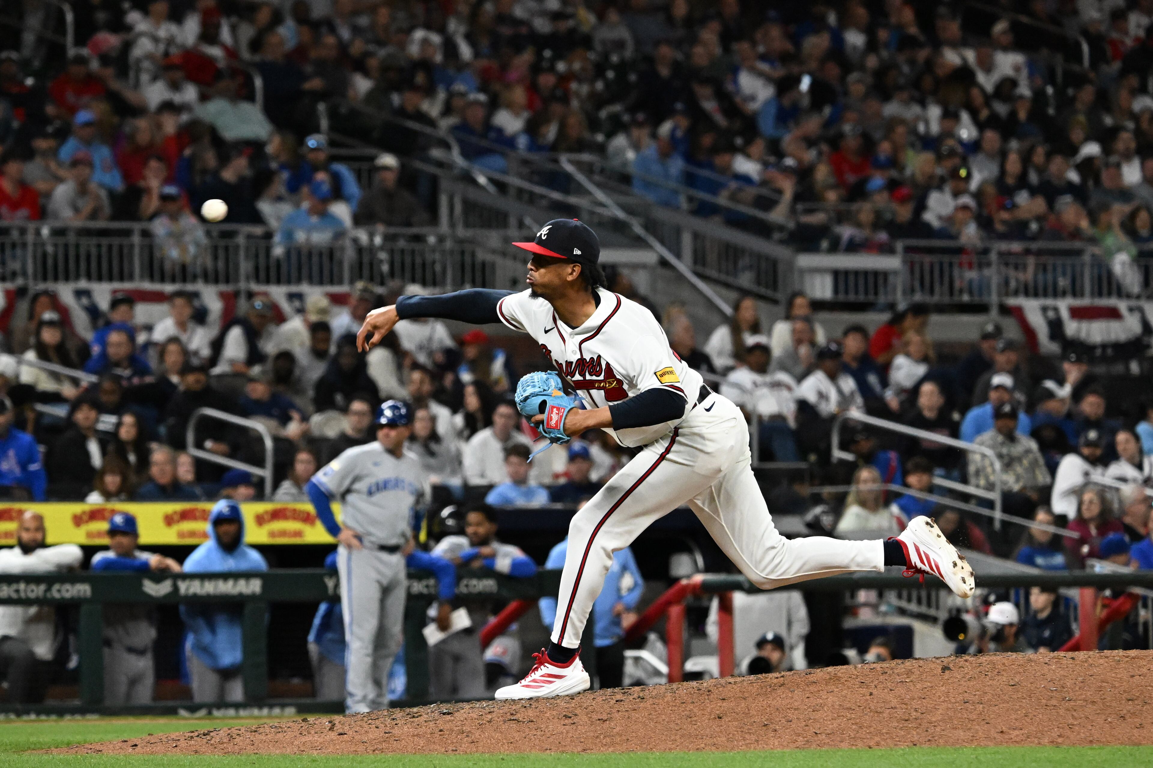 Atlanta Braves pitcher Osvaldo Bido throws a pitch during the ninth inning of a baseball game at Truist Park, Saturday, March 28, 2026, in Atlanta. Atlanta Braves Dominic Smith hit a grand slam during the 9th inning to win 6-2 over Kansas City Royals. (Hyosub Shin/AJC)