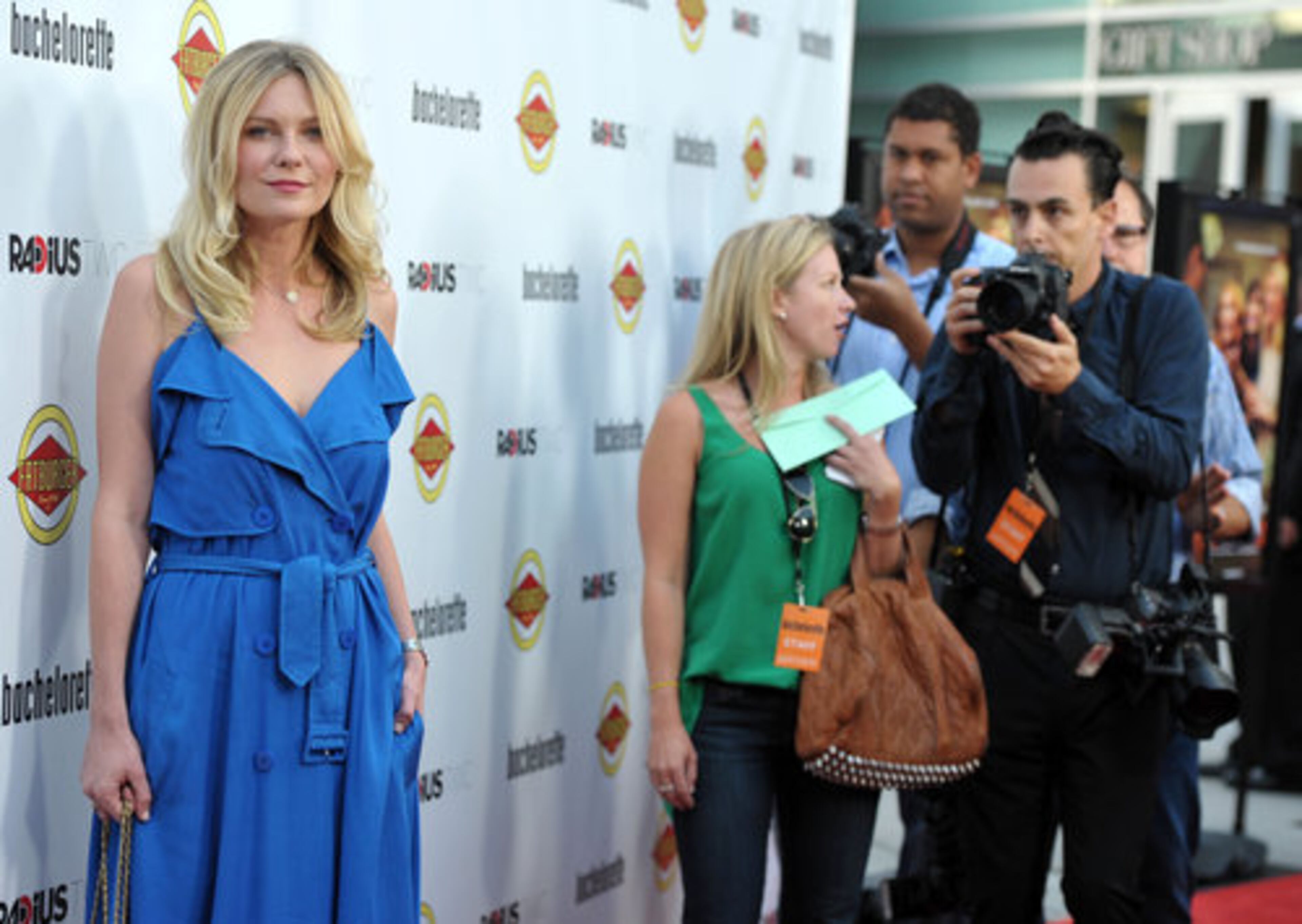 Actress Kirsten Dunst, who plays one of the bridesmaids, chose blue for the red carpet.