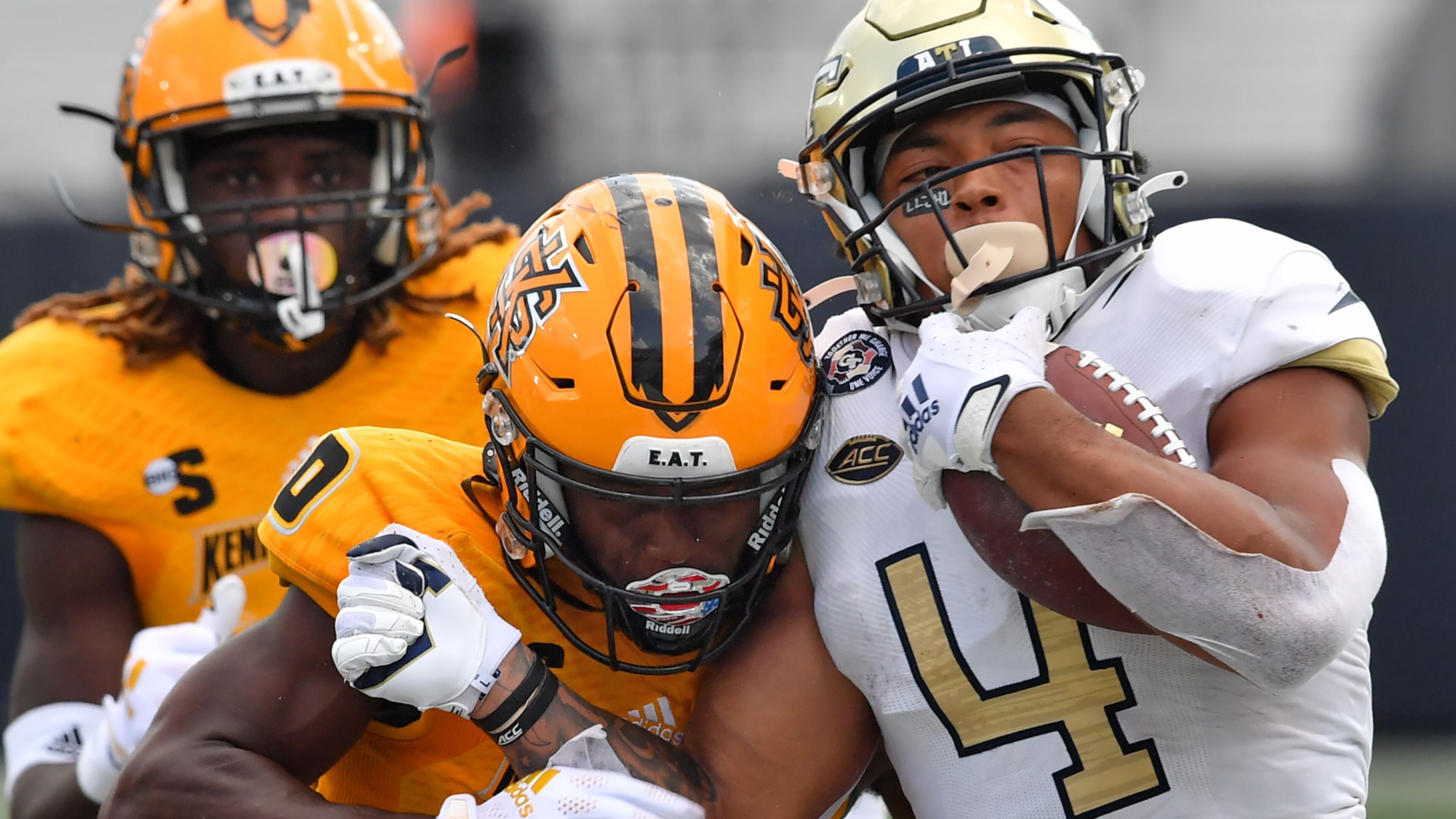 September 11, 2021 Atlanta - Georgia Tech's running back Dontae Smith (4) gets tackled by Kennesaw State's defensive back Java'n Singletary (0) during the second half of an NCAA college football game at Georgia Tech's Bobby Dodd Stadium in Atlanta on Saturday, September 11, 2021. Georgia Tech won 45-17 over Kennesaw State. (Hyosub Shin / Hyosub.Shin@ajc.com)
