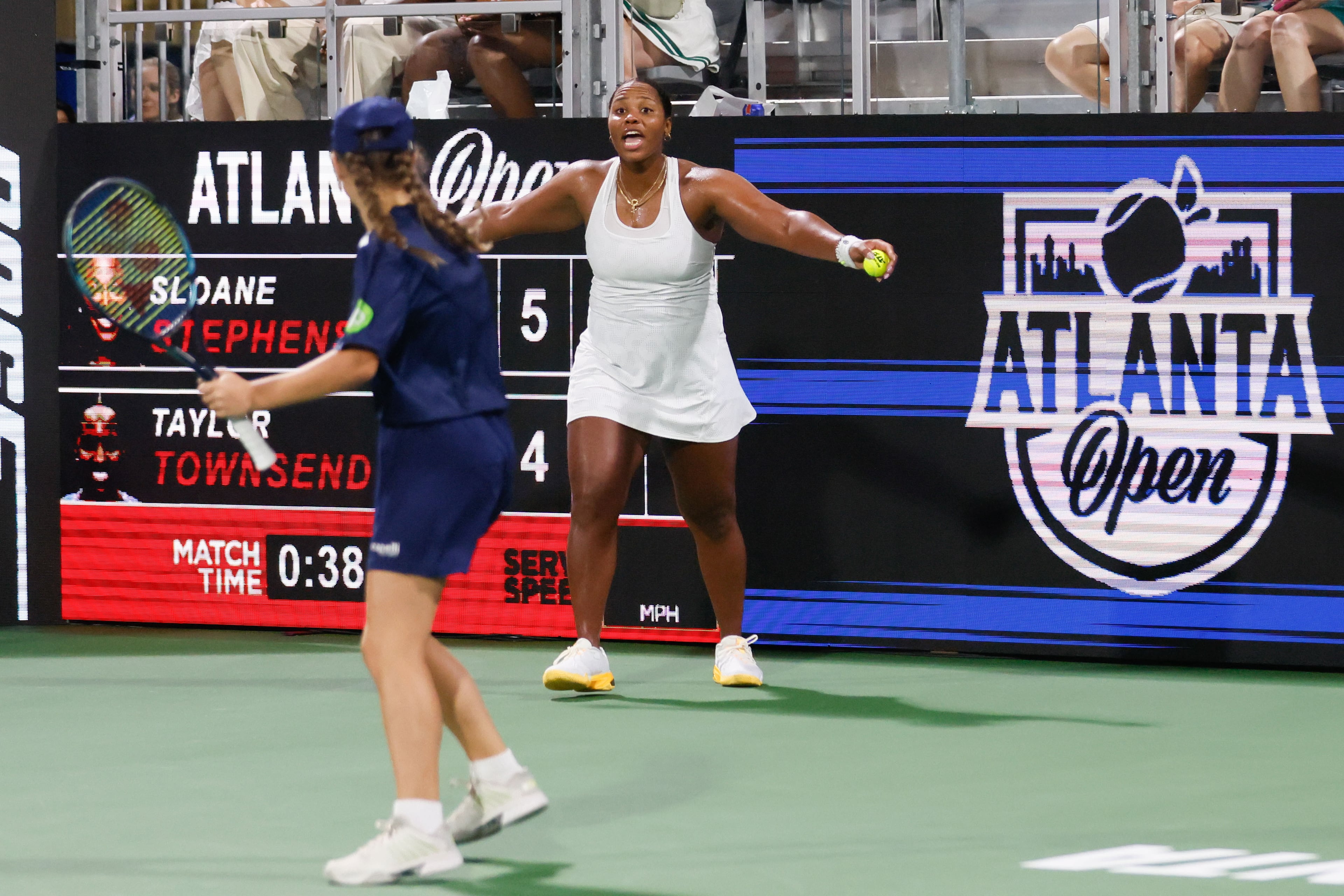 Taylor Townsend reacts with a ball boy after she won a point against Sloane Stephens during an exhibition match in the Atlanta Open at Atlantic Station on Sunday, July 21, 2024, in Atlanta.
(Miguel Martinez / AJC)