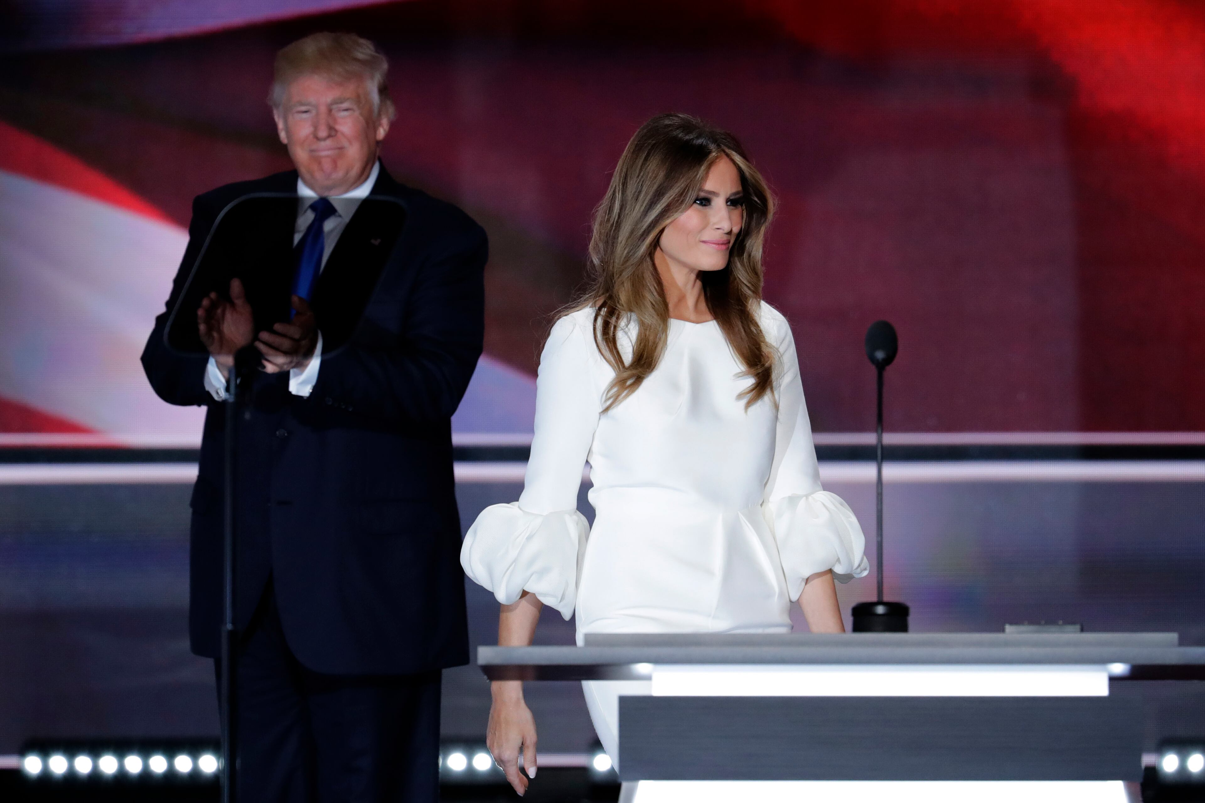 Melania Trump, wife of Republican Presidential Candidate Donald Trump walks to the stage as Donald Trump applauds during the opening day of the Republican National Convention in Cleveland, Monday, July 18, 2016. (AP Photo/J. Scott Applewhite)