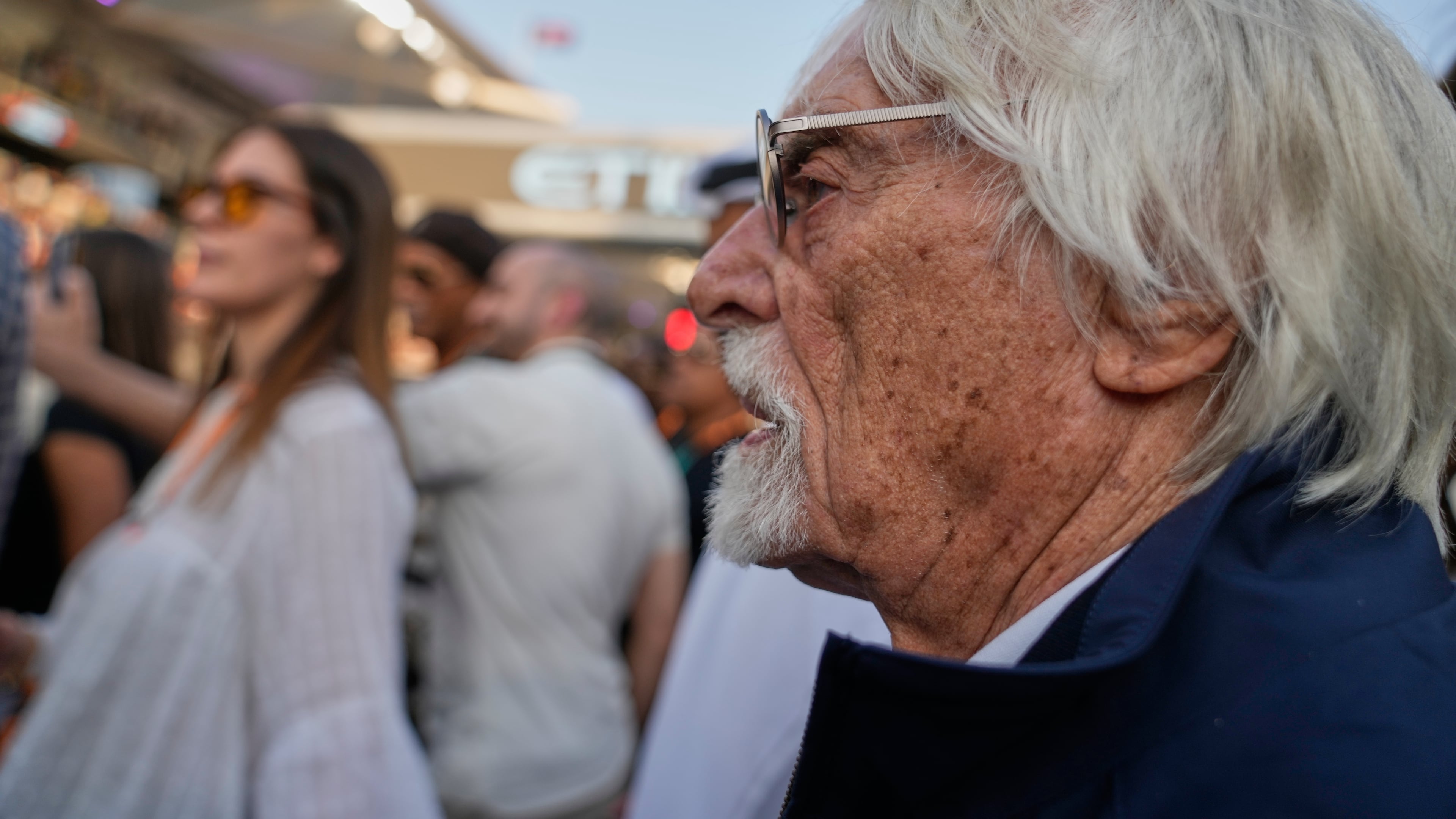 FILE - Former Formula One chief Bernie Ecclestone stands on the starting grid before the Abu Dhabi Formula One Grand Prix in Abu Dhabi, United Arab Emirates, Dec. 7, 2025. (AP Photo/Darko Bandic, File)