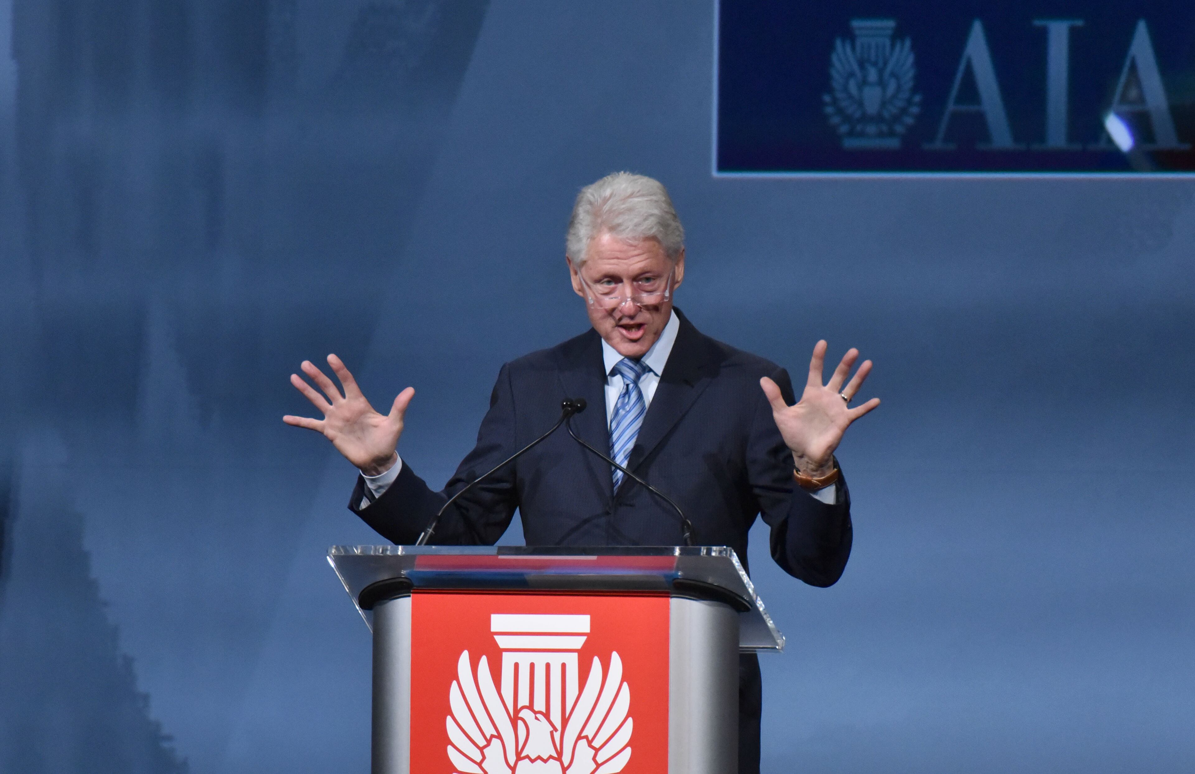 Former President Bill Clinton delivers the keynote address during the 2015 AIA National Convention and Design Exposition at the Georgia World Congress Center on Thursday, May 14, 2015. According to Political Insider blogger Jim Galloway: "He spoke of climate change. He spoke of vertical gardens in urban landscapes – an appropriate topic for the American Institute for Architects. The former president even mentioned a recent visit to Liberia. But he never said the 'H' word. Not one mention of his wife’s Democratic run for president." HYOSUB SHIN / HSHIN@AJC.COM