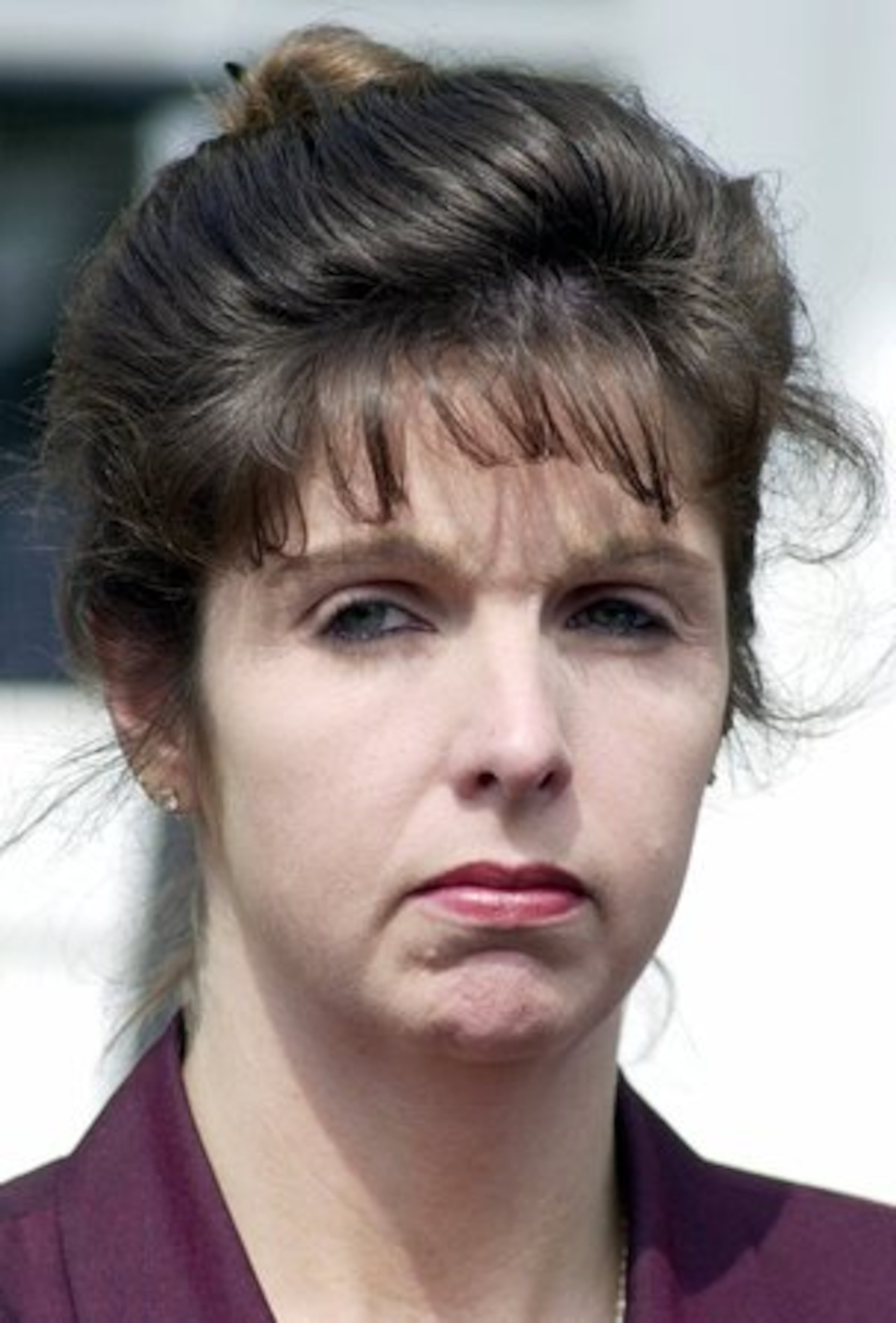 In this August 2001 photo, Lynn Turner, whose former husband and boyfriend both died mysterious deaths, looked on during a news conference in Cumming. Turner's lawyer declared her innocence.