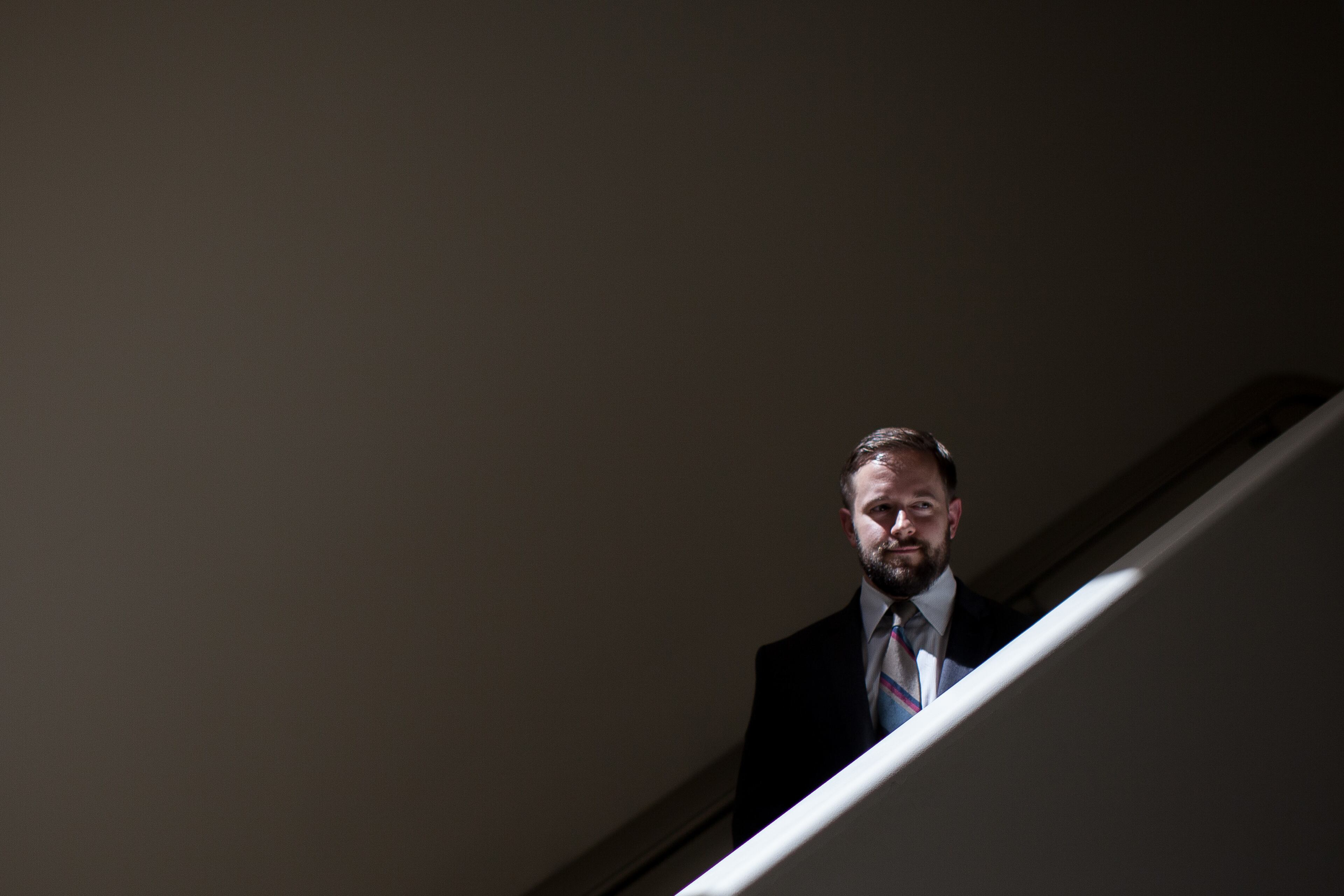Ryan Roemerman, interim executive director for the LGBT Institute, poses for a portrait at the Center for Civil and Human Rights, Tuesday, Sept. 1, 2015, in Atlanta. Leaders of an Atlanta museum want the space focused on modern and historic civil rights to contribute to a national push to ensure LGBT rights, particularly in southern states. (AP Photo/Branden Camp)