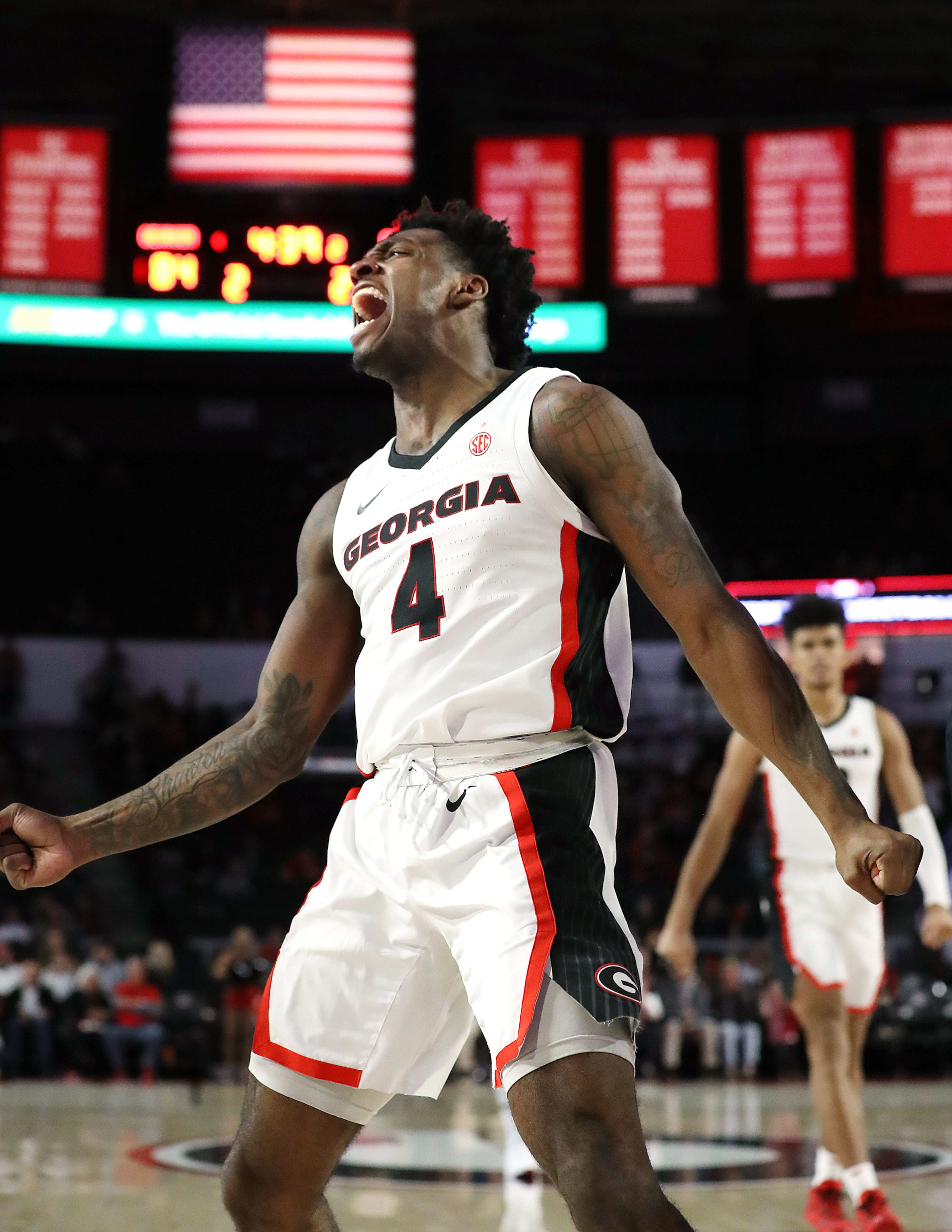 Georgia senior Tyree Crump reacts to drawing a foul after going to the basket for two against Citadel during the second half in a NCAA college basketball game on Tuesday, November 12, 2019, in Athens. Curtis Compton/ccompton@ajc.com