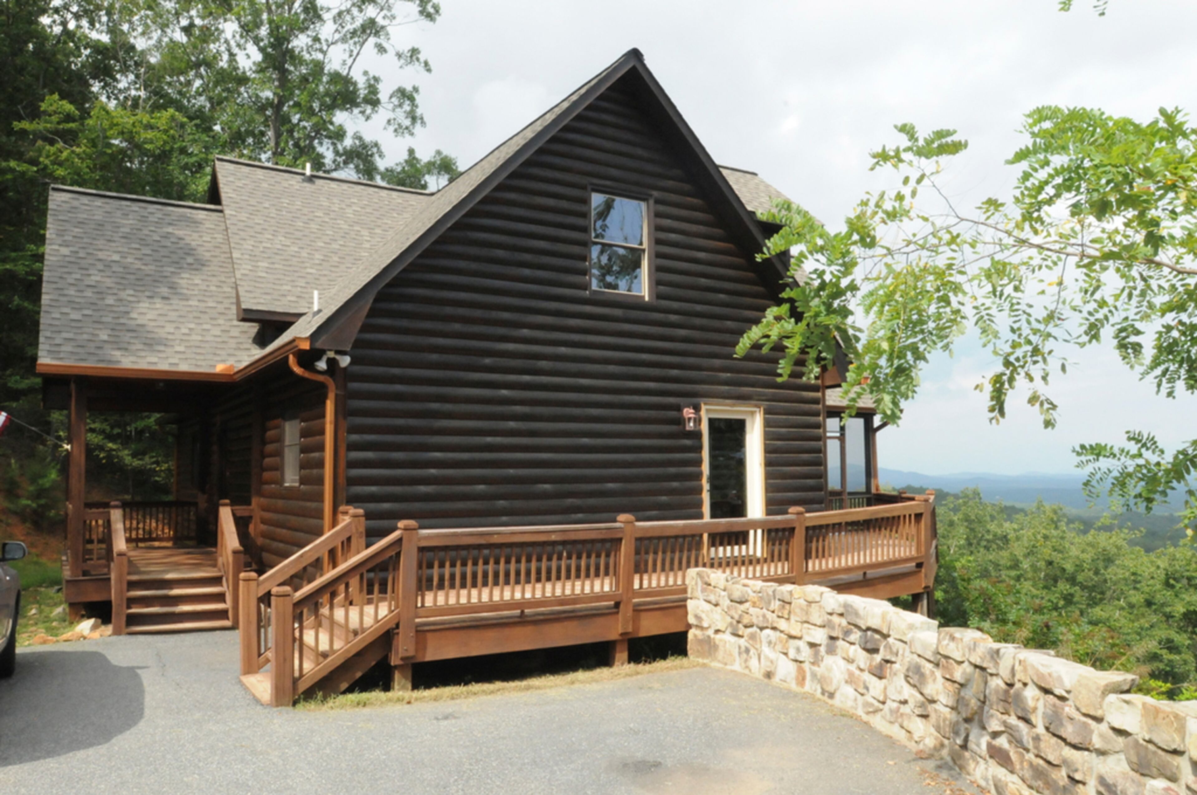 Rick Young, a former builder, says he appreciates the construction of the house. It looks like a log cabin but is conventionally framed.