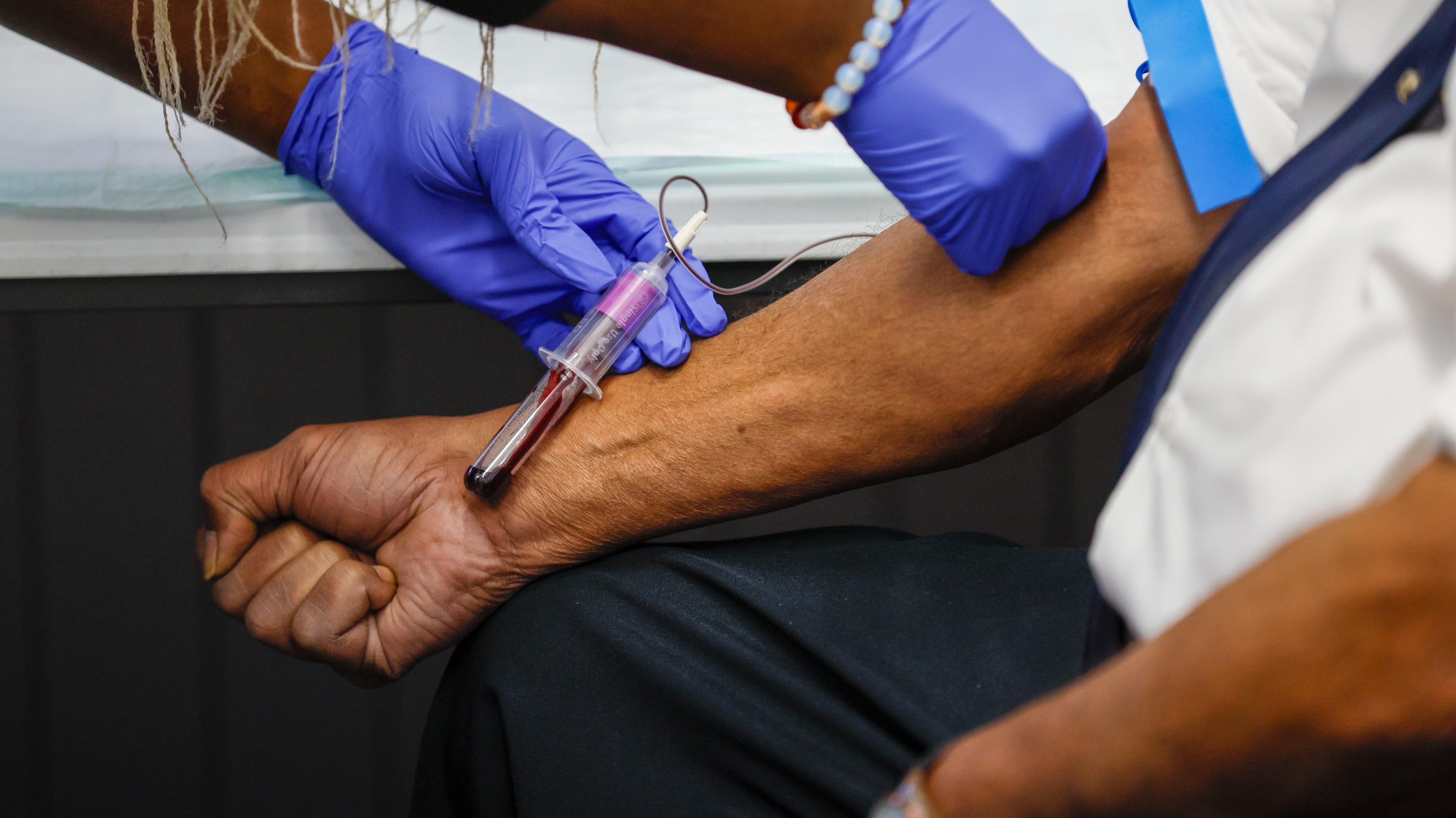 A phlebotomist conducted a blood screening in 2025 for a Rome, Ga., resident as part of a study led by researchers from Emory University’s Rollins School of Public Health. The study investigates the presence of ‘forever chemicals’ (PFAS). (Miguel Martinez/AJC)