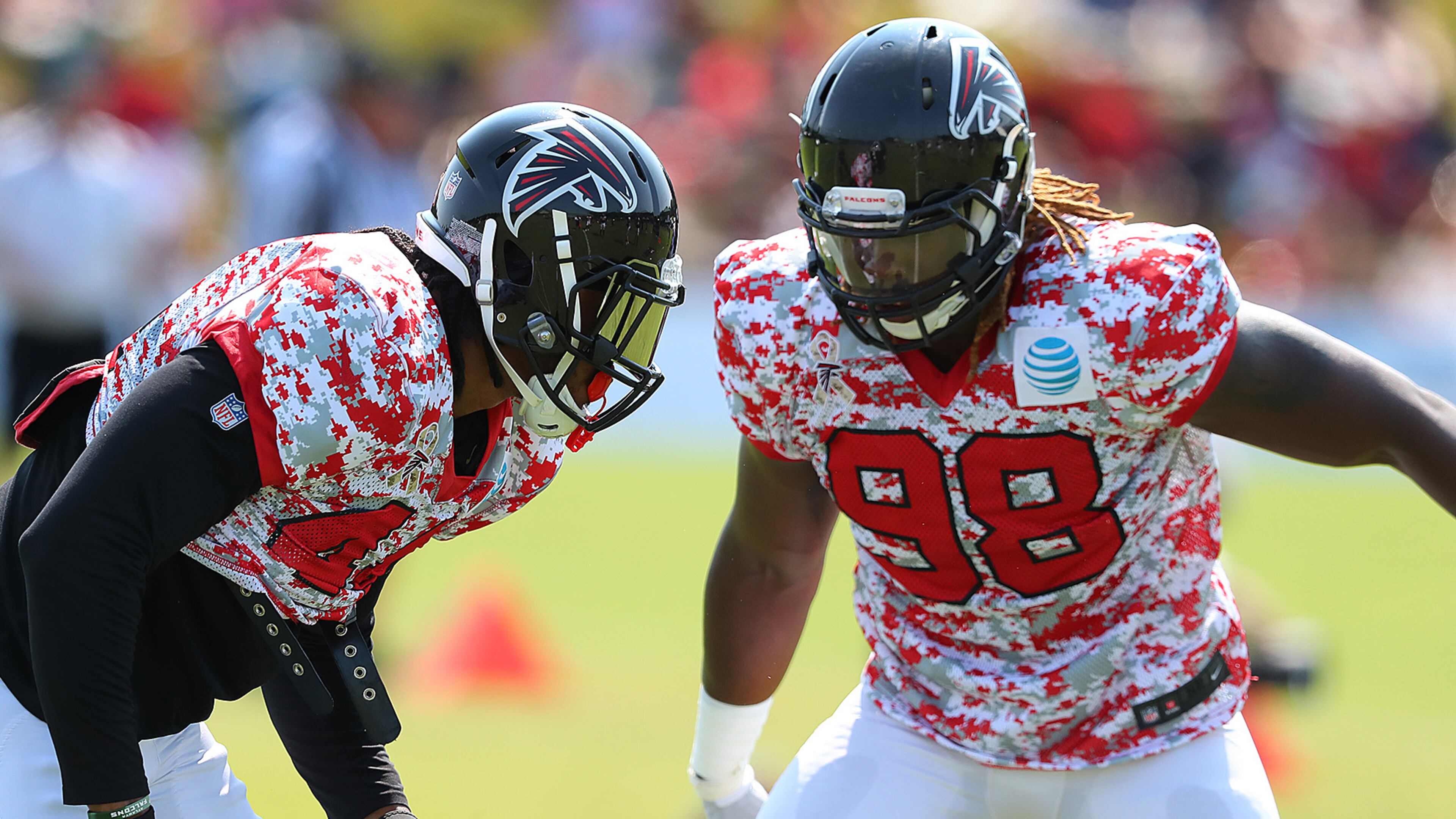Falcons Vic Beasley Jr. works against Takkarist McKinley during team practice on Sunday, Aug. 6, 2017, in Flowery Branch.