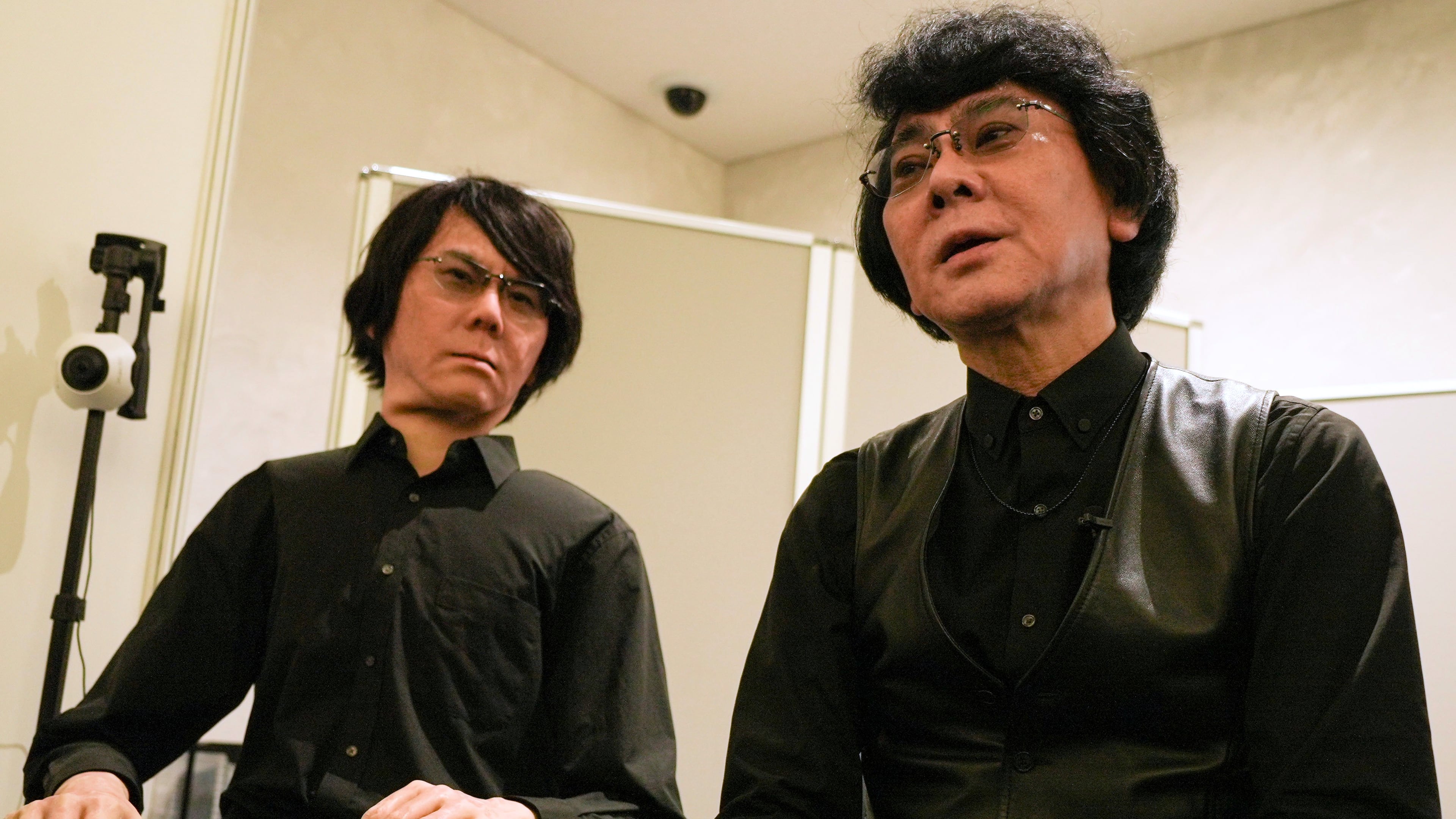 Professor Hiroshi Ishiguro, right, of Osaka University talks to android robot Geminoid at the Humanoids Summit 2026 in Tokyo, Thursday, May 28, 2026. (AP Photo/Ayaka McGill)