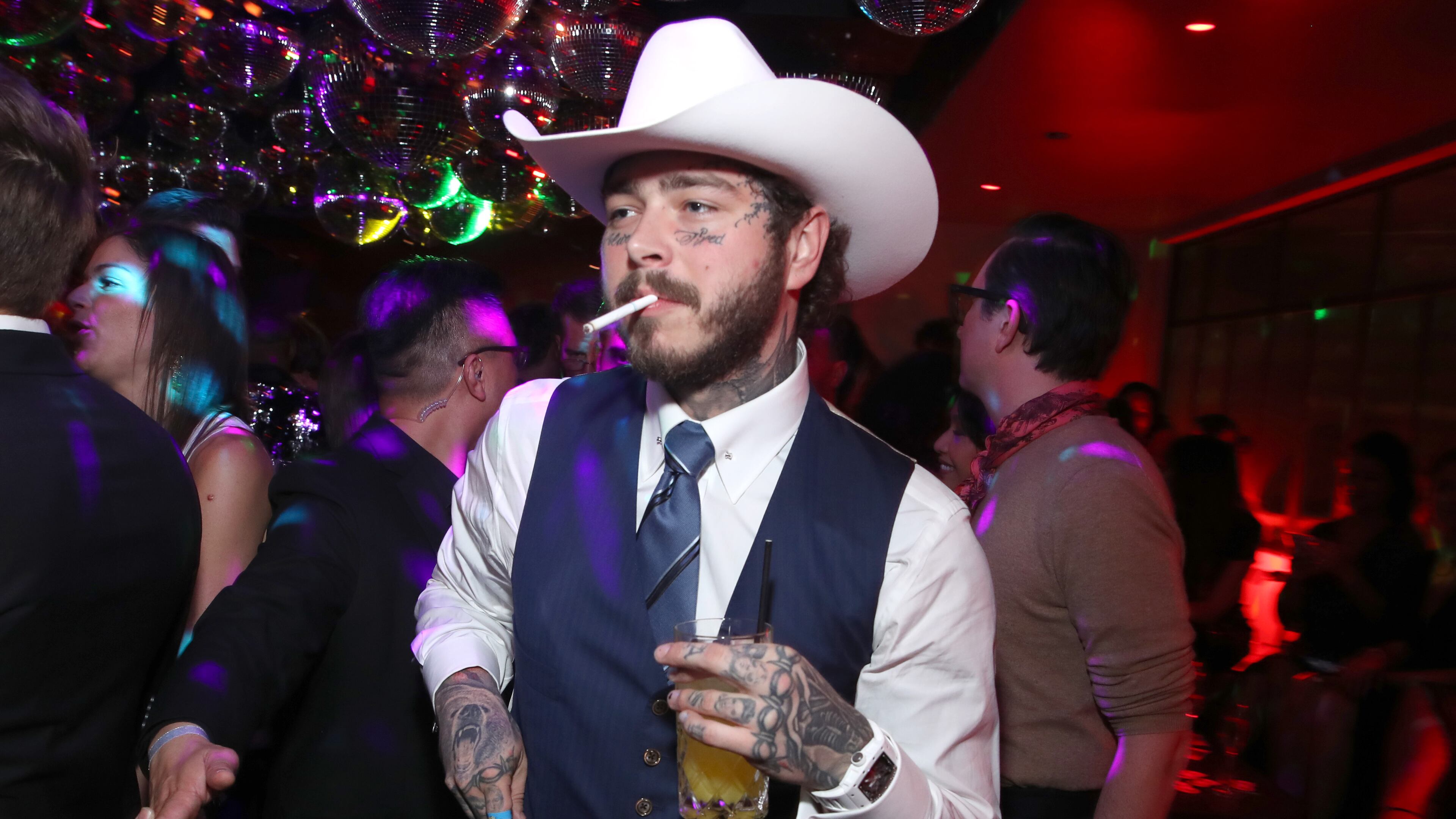 WEST HOLLYWOOD, CALIFORNIA - DECEMBER 05: Post Malone performs the 2019 GQ Men of the Year After Party Presented By Samsung at The West Hollywood EDITION on December 05, 2019 in West Hollywood, California. (Photo by Randy Shropshire/Getty Images for GQ Men of the Year 2019)