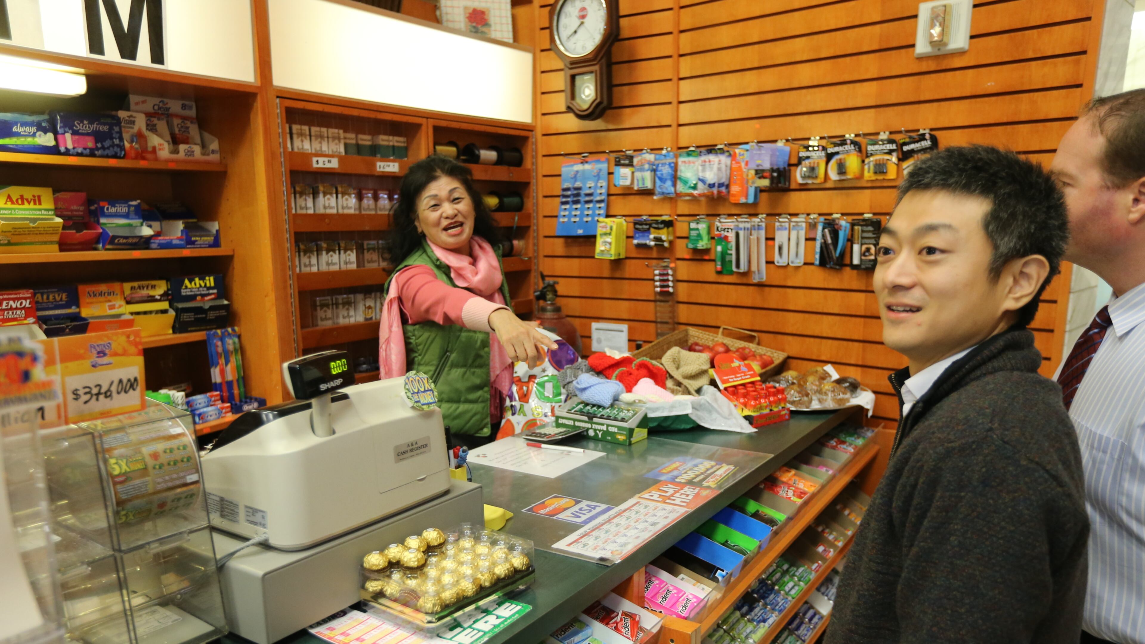 The scene at Gateway Newsstands in the Alliance Center building at 3500 Lenox Road near Phipps Plaza, where owner Young Soo Lee laughed with customers.