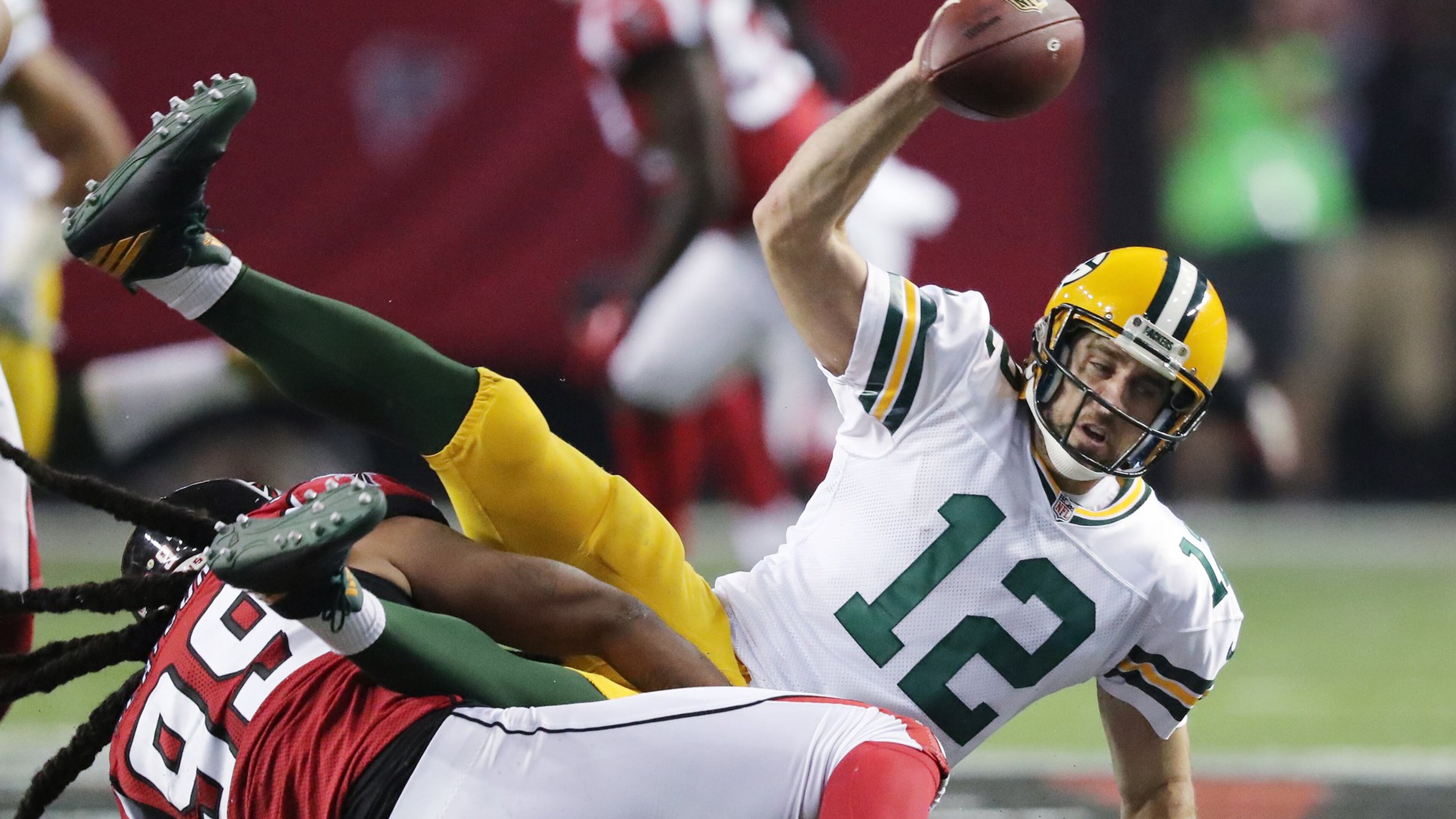 Falcons defensive end Adrian Clayborn sacks Packers quarterback Aaron Rodgers during the third quarter in an NFL football game on Sunday, Oct. 30, 2016, in Atlanta. Curtis Compton /ccompton@ajc.com