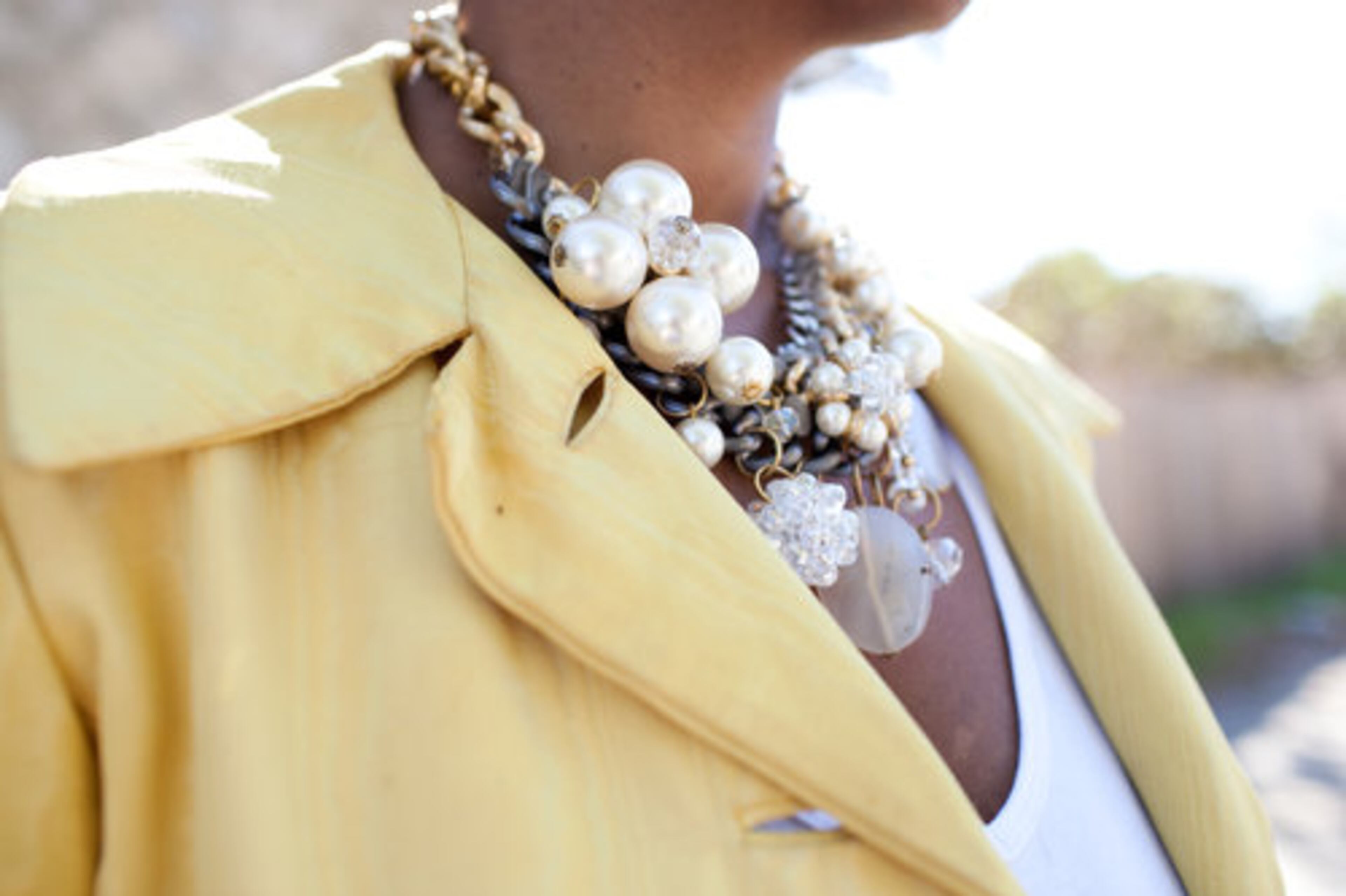 A WEAKNESS: Accessories, because they can transform any outfit. One time I purchased a tattered vintage dress for $5 exclusively for the buttons and rhinestone trimming. I wear the rhinestone trim as a tie necklace.