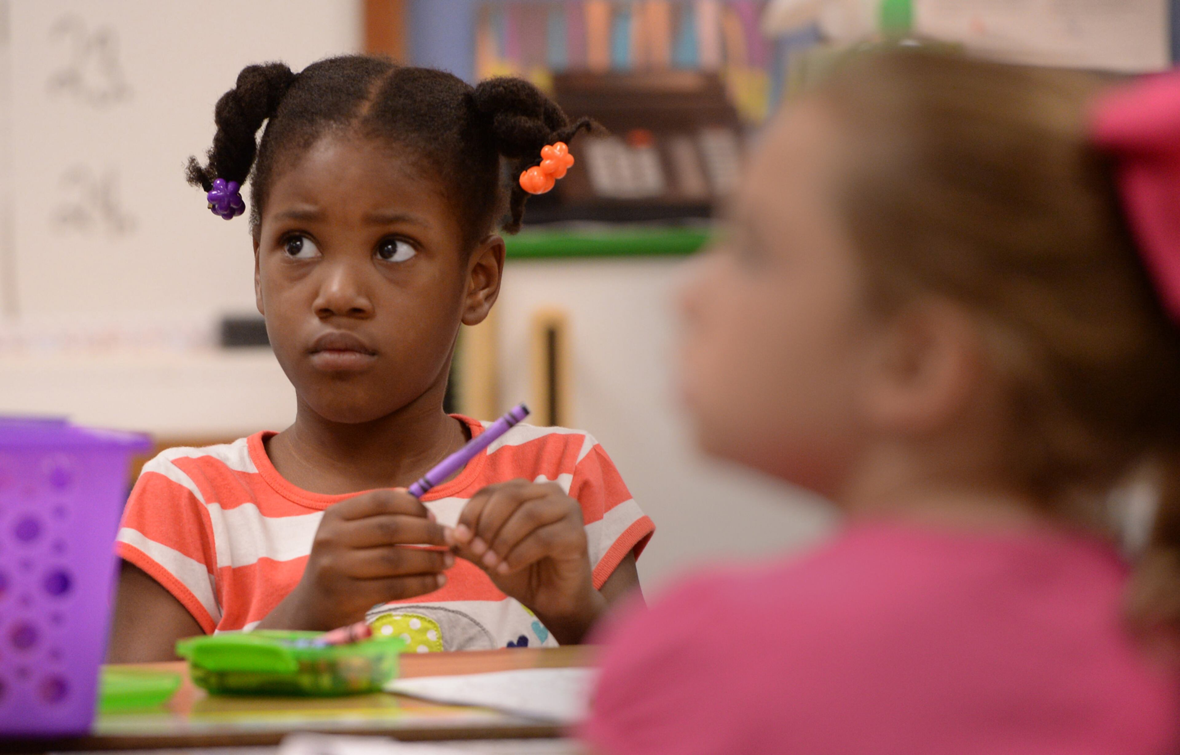 Karie Netters listens to her teacher on the first day of school at Midvale Elementary on Monday, August 12, 2013. JOHNNY CRAWFORD / JCRAWFORD@AJC.COM