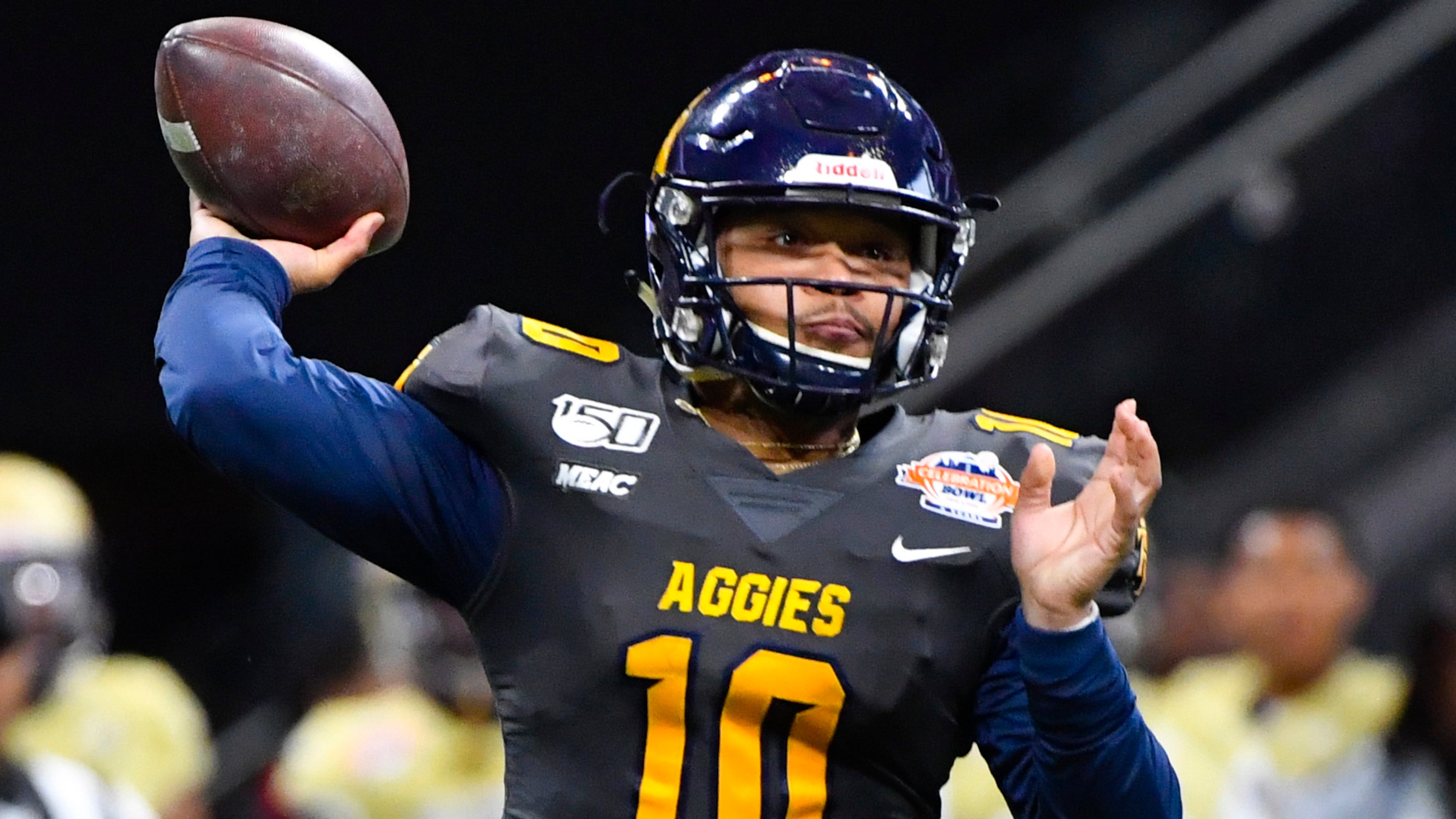 North Carolina A&T quarterback Kylil Carter (10) passes during the first half of the Celebration Bowl game against Alcorn State Saturday, Dec. 21, 2019, at Mercedes-Benz Stadium in Atlanta.
